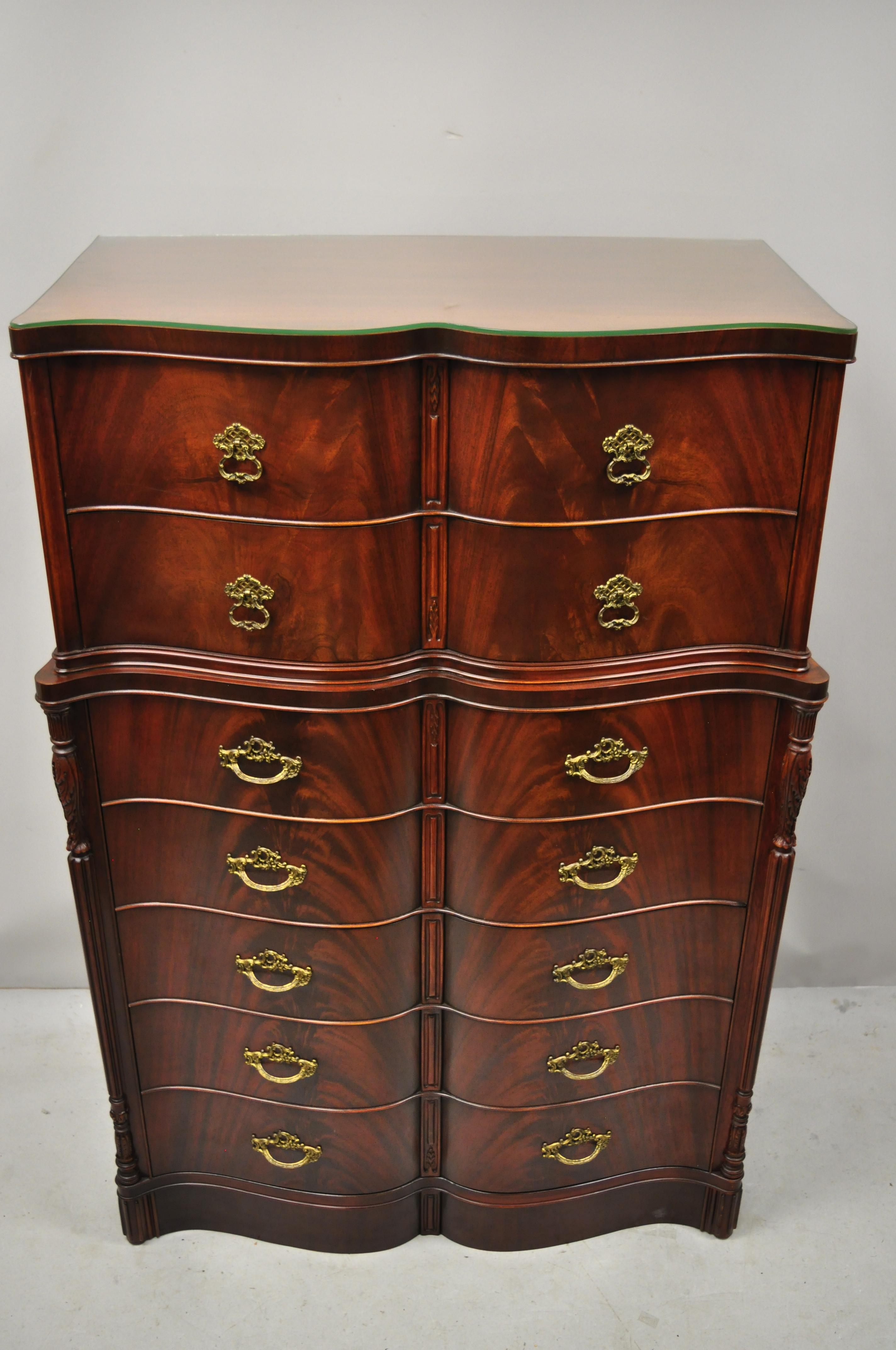Chinese Chippendale Serpentine bow front flame mahogany tall chest dresser. Item features custom glass top, bowed serpentine front, beautiful wood grain, 7 dovetailed drawers, solid brass hardware, quality American craftsmanship, great style and