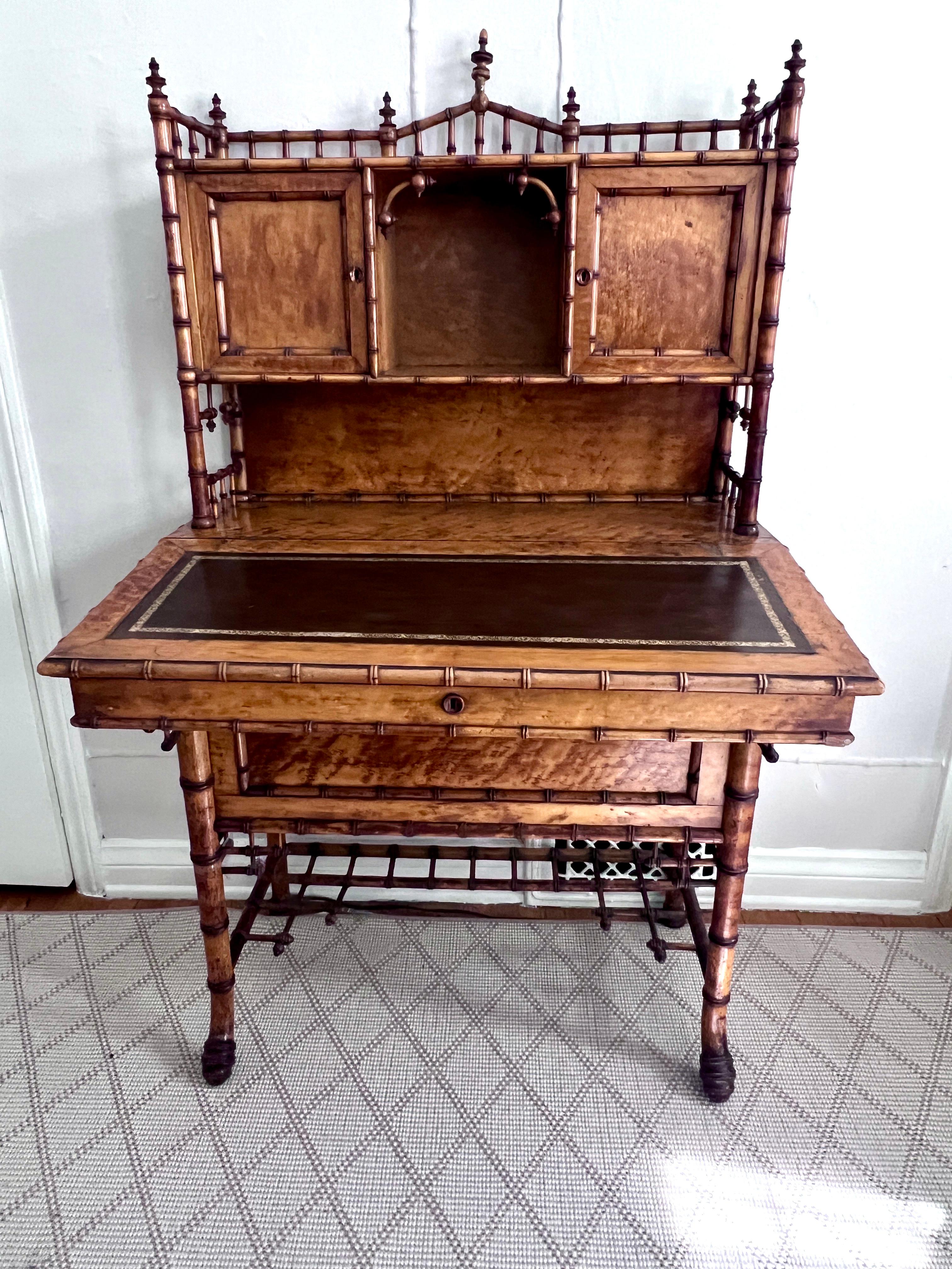 Stunning Hand Crafted English Chinese Chippendale Bamboo Secretary.

This handsome and special Secretary has two top facing doors and a Middle 