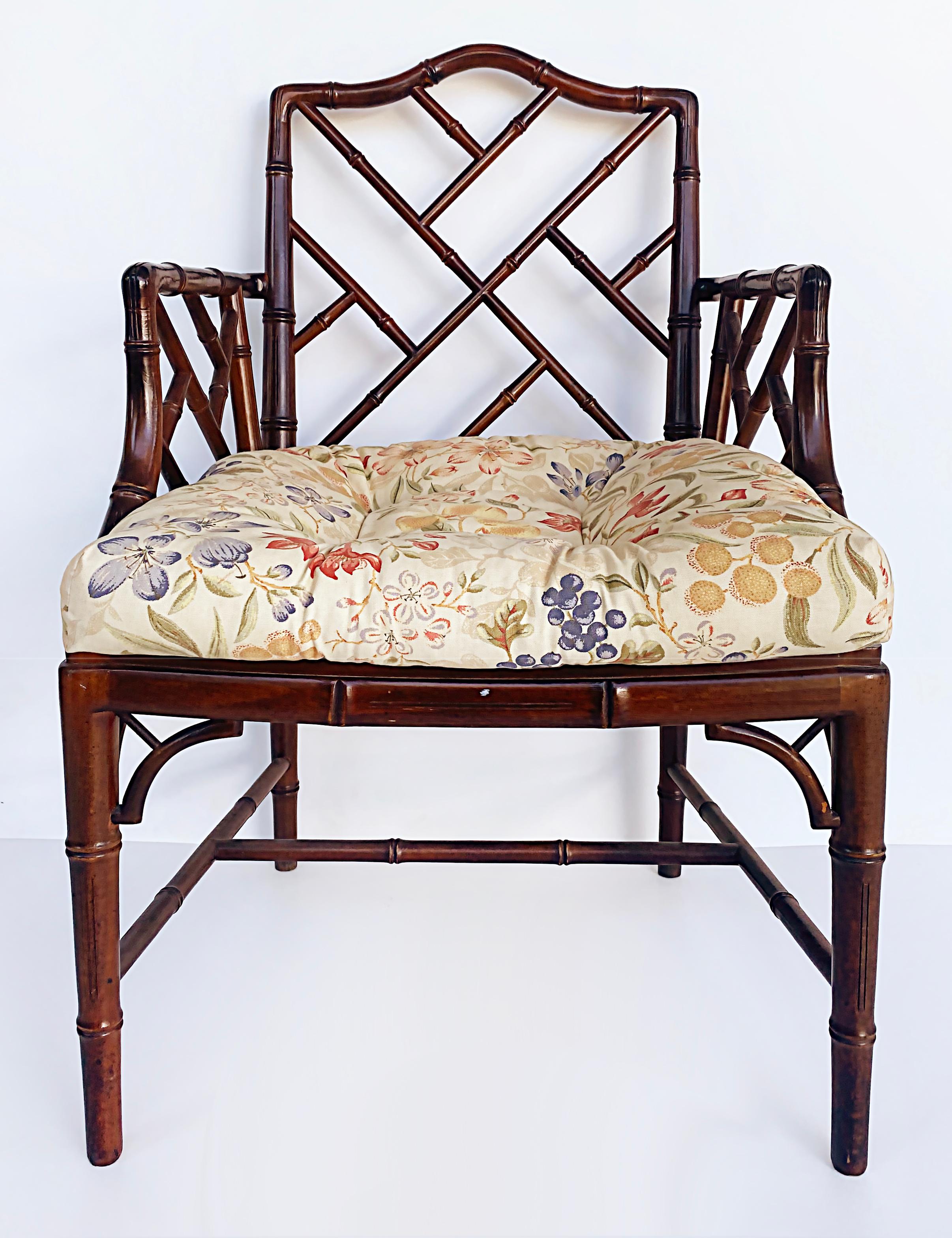 Chinese Chippendale style faux bamboo armchair, caned seat, loose seat cushion

Offered for sale is a Chinese Chippendale style faux bamboo armchair with caned seat and a floral upholstered loose seat cushion. The chair is great as additional
