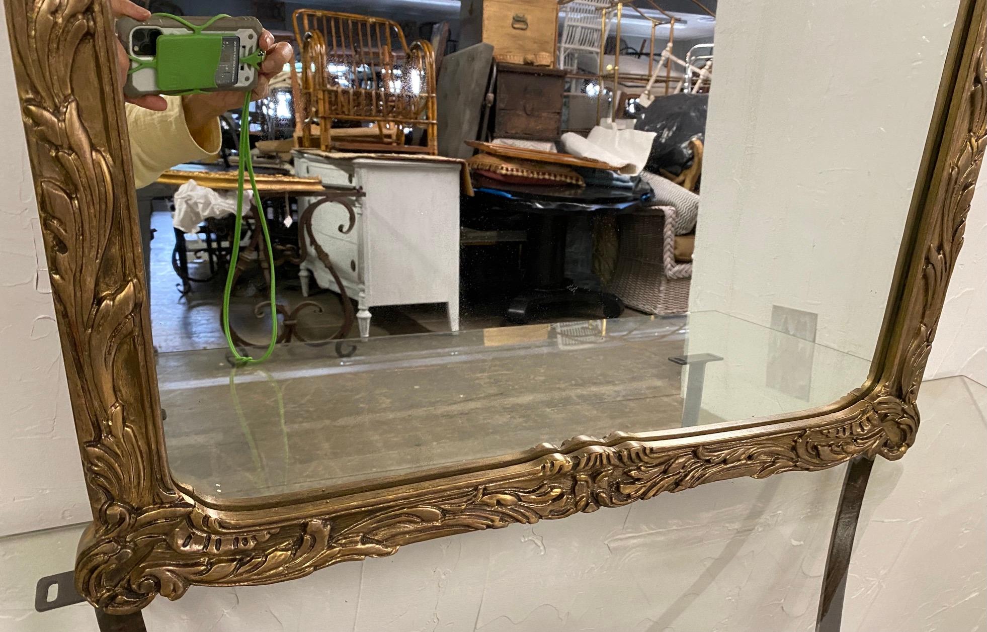 Chinese Chippendale Chinoiserie style gold toned pagoda mirror.
Use for fireplace mirror, mantle mirror, console mirror, wall mirror, pier mirror.
The Rococo style wall mirror in a warm guilt antique finish will also work great as dresser,