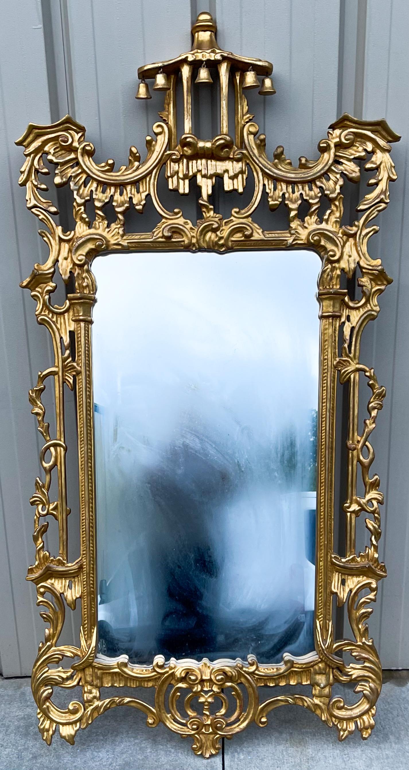 Always a favorite! This is a Chinese chippendale style Italian giltwood pagoda form mirror. It is in very good condition and dates to the 70s.