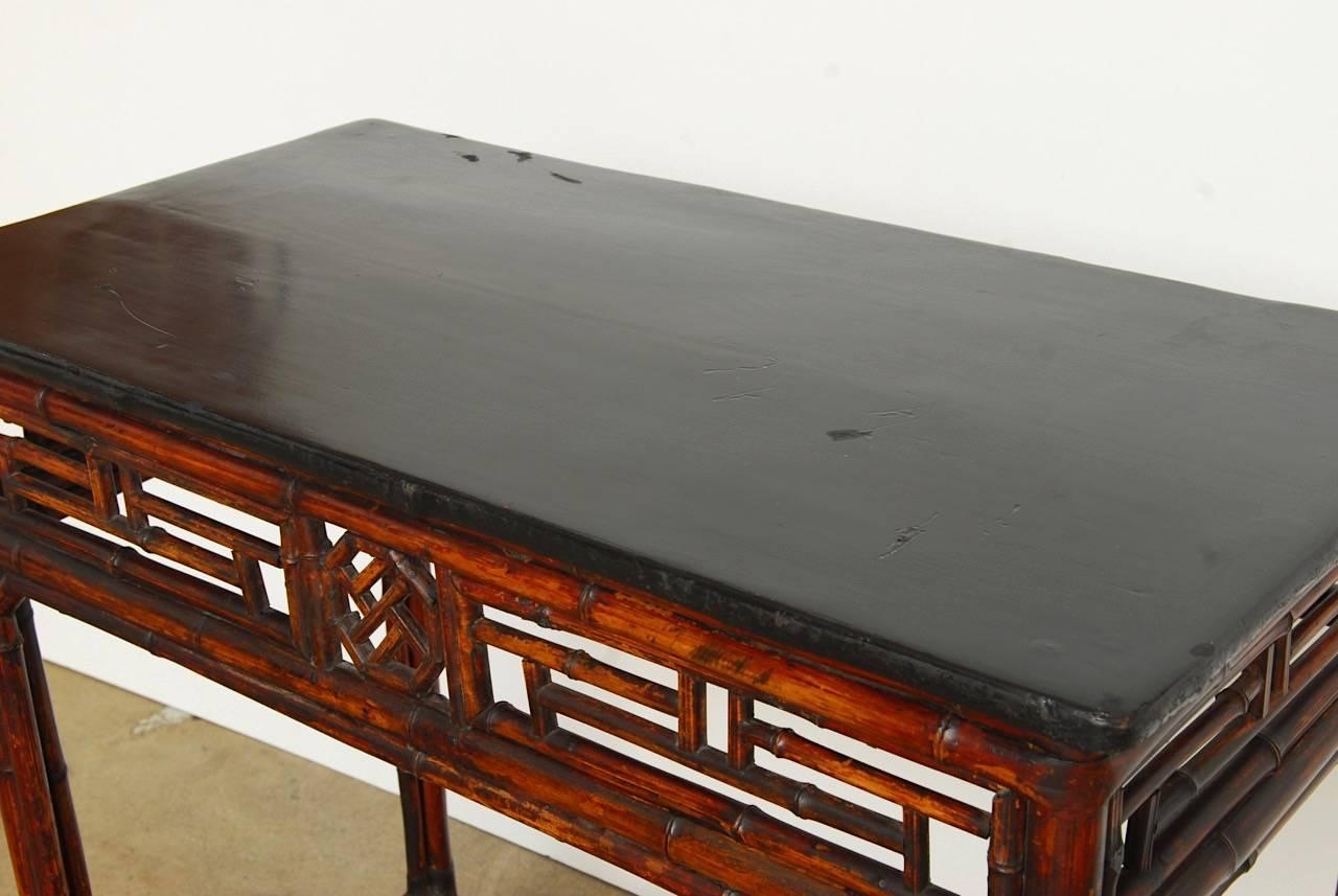 20th Century Chinese Chippendale Style Lacquered Bamboo Console Table