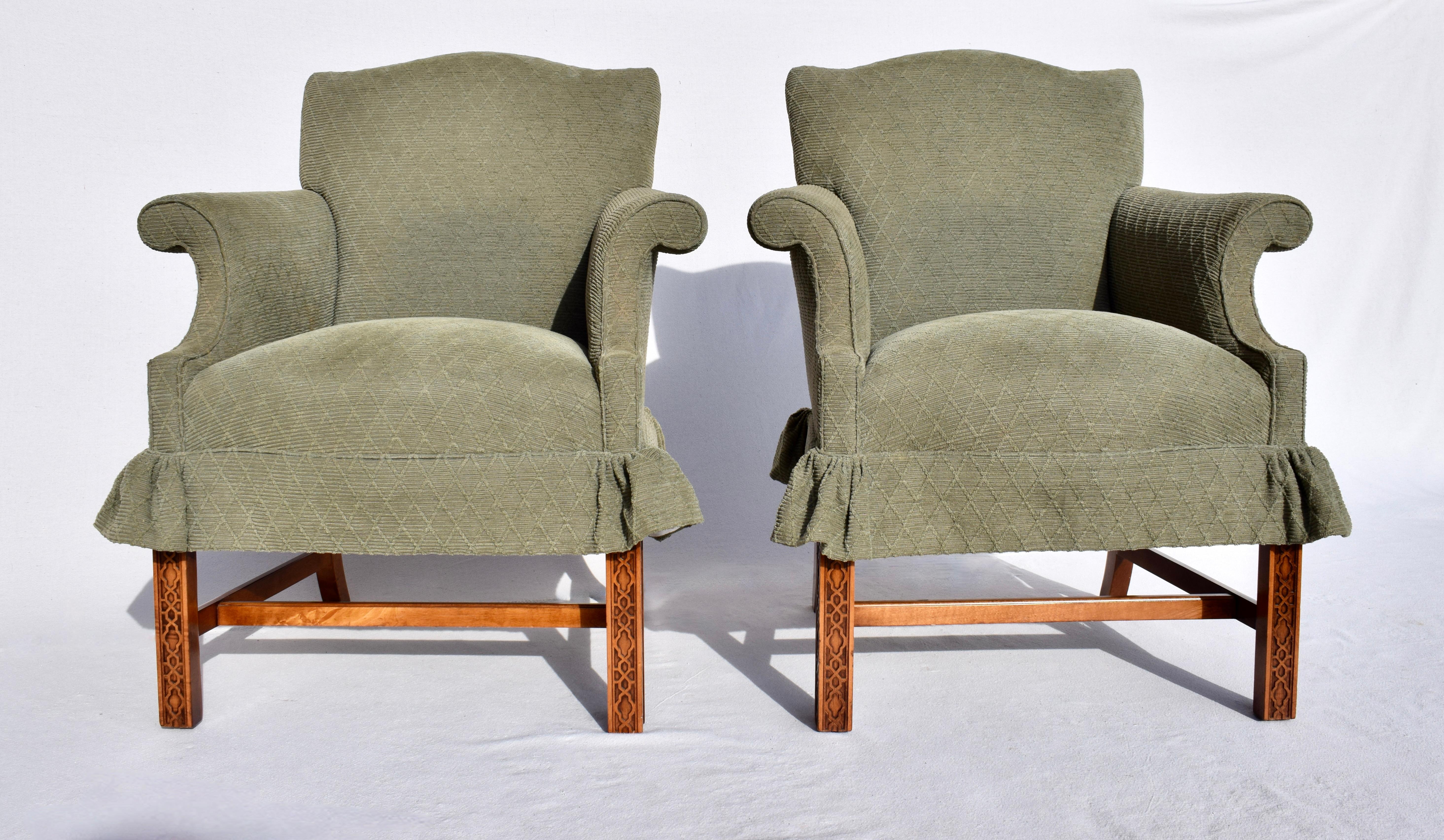A pair of very sweet George III Chippendale style armchairs in Sage green textured diamonds Chenille upholstery with Chinese Chippendale fretwork to the Mahogany bases with H stretchers. Cradling comfort; heirloom quality.  Cozy silhouettes inside