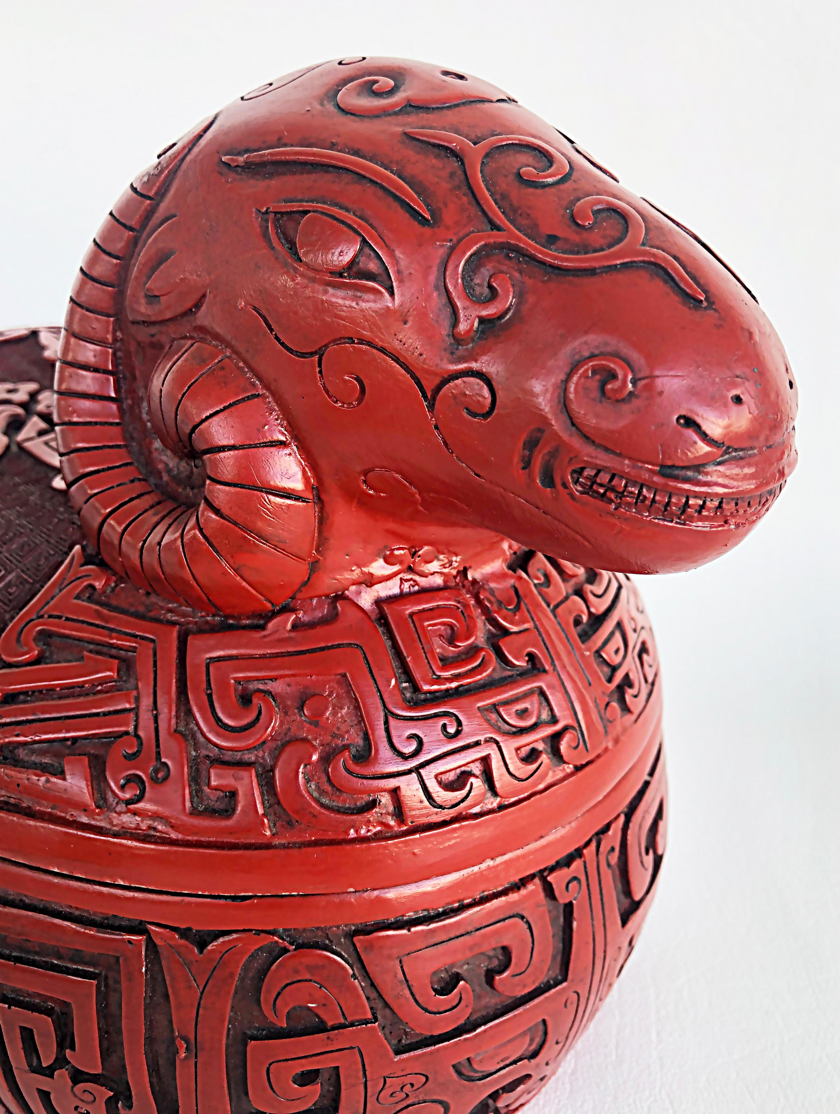 Chinese cinnabar carved ram covered box with lacquered interior

Offered for sale is a box created in the form of a ram with a lacquered interior. This vintage cinnabar box is carved in the archaic style from the Republic Period 1912-1949. 

