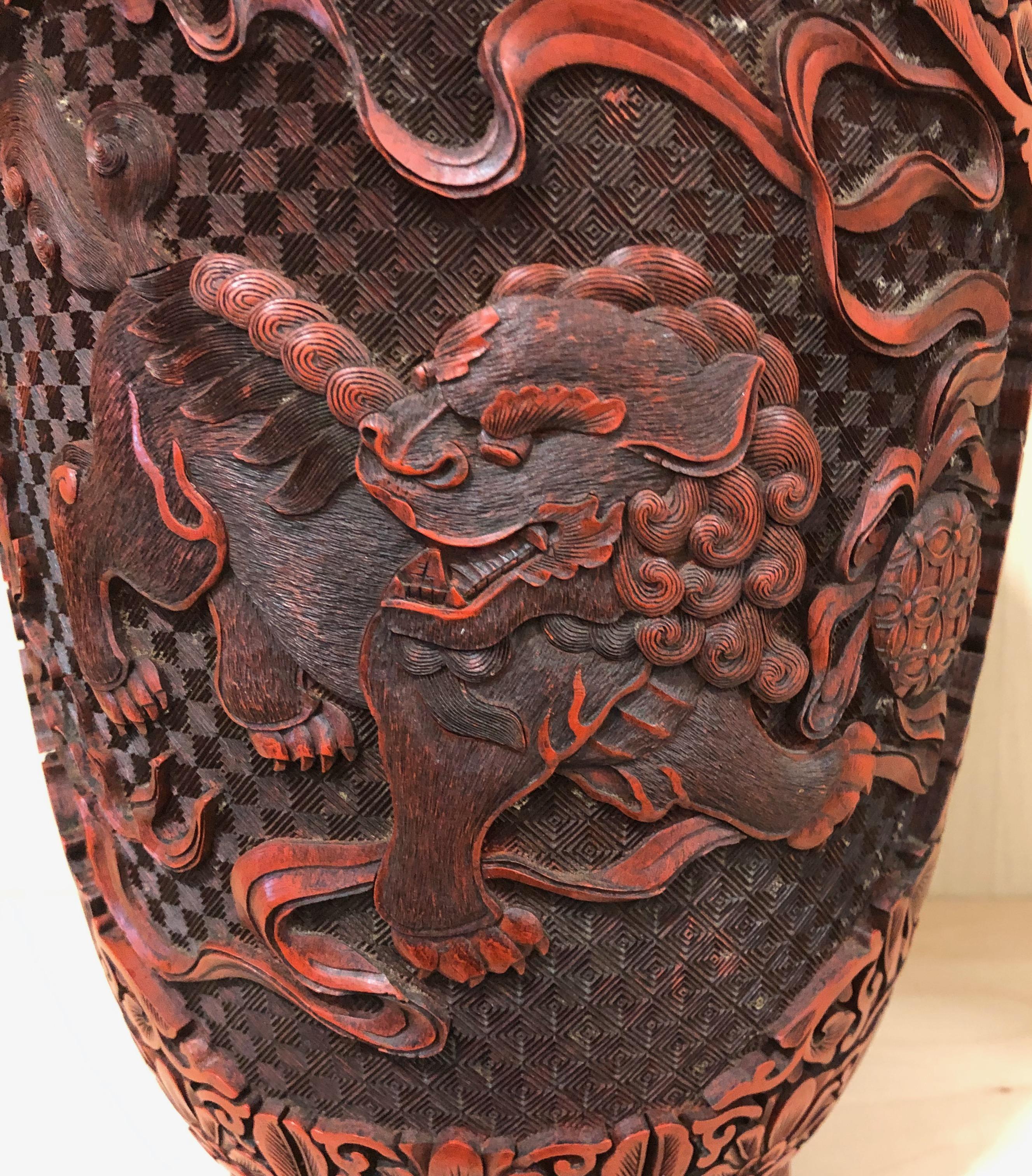 Lacquer Chinese Cinnabar Vase with Finely Carved Foo Dogs, 19th Century For Sale