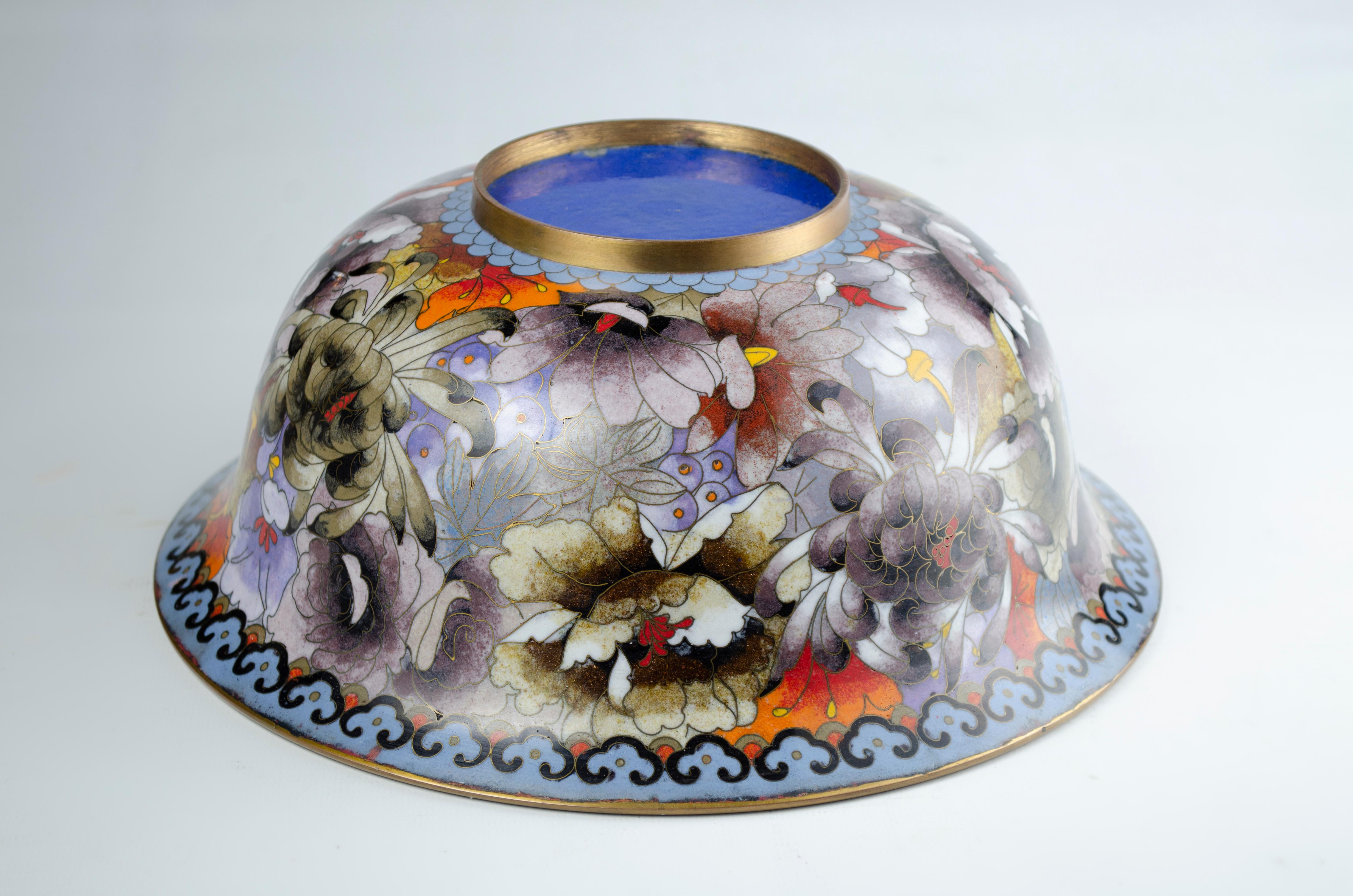 Chinese Cloisonne Bowl
Bronze and enamel materials
made with Cloisonne technique
Origin China Circa 1950
Floral decoration
perfect condition
cloisone technique on bronze
Cloisonné or honeycomb enamel is an ancient technique for decorating metal