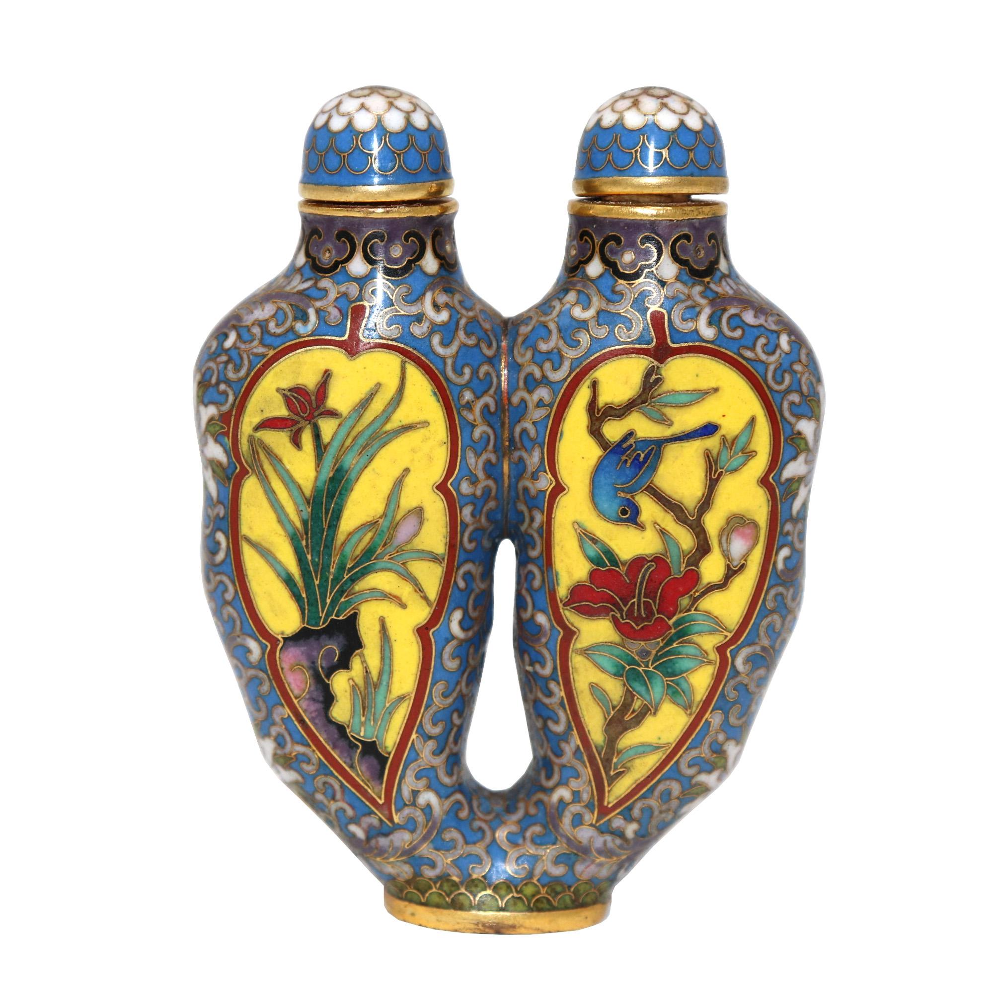 Chinese cloisonné double chamber snuff bottle, for containing two different varieties of snuff, the twin chambers of diploid scalloped oval contour, each body in the shape of an Artemisia leaf, decorated with leaf-shaped cartouches enclosing