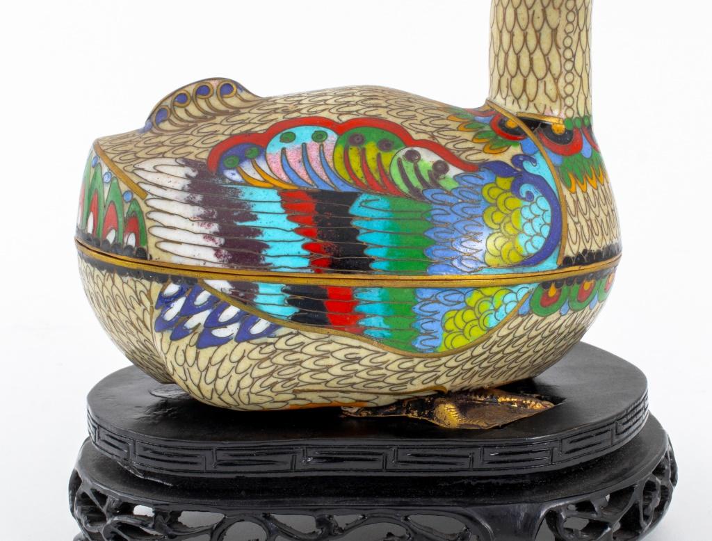 Pair of Chinese Cloisonne Enamel Bird Form Boxes with Gilt Metal, on fitted carved, pierced, and ebonized wood stands. Each overall: 6.75