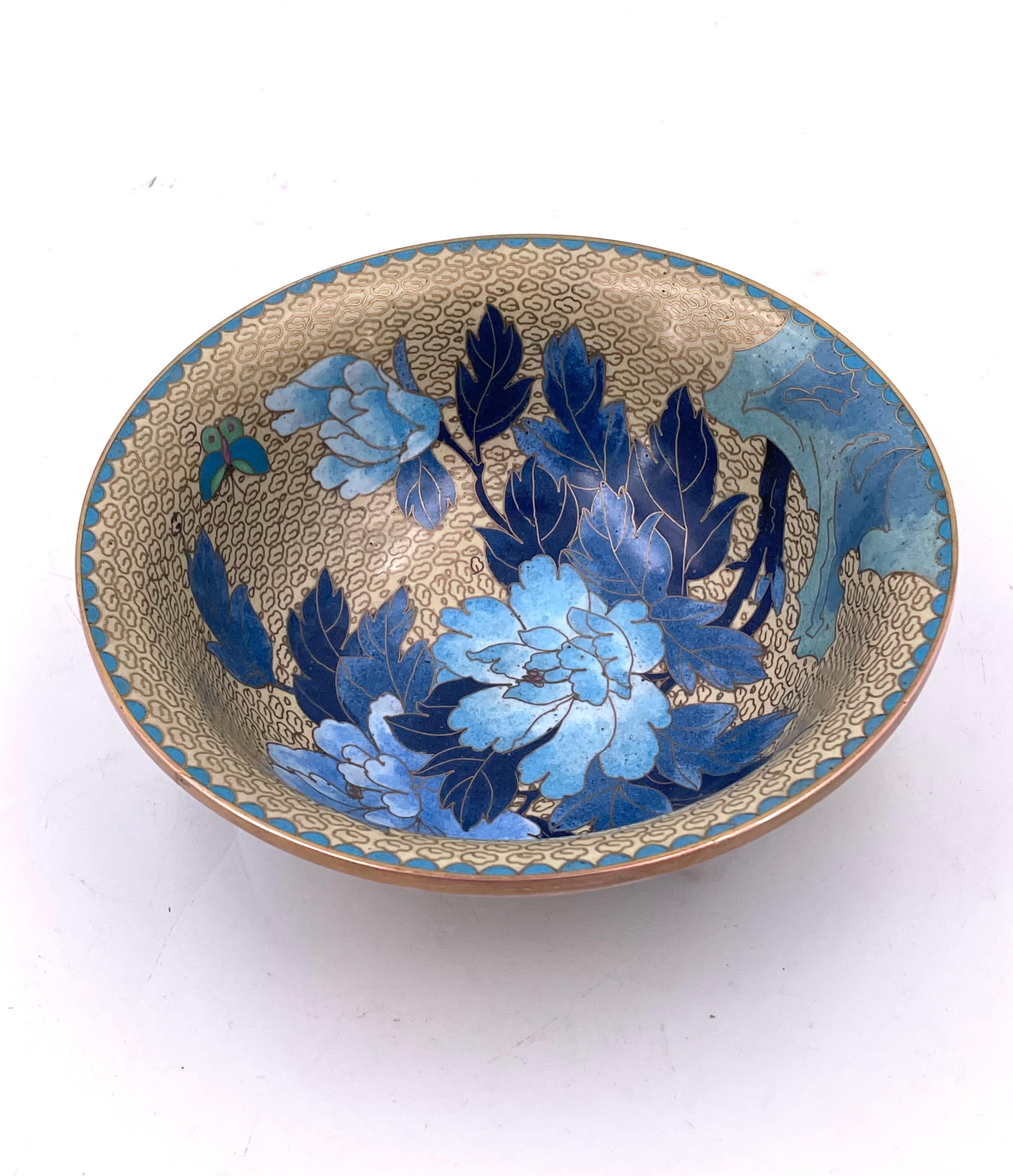 Gorgeous, Chinese cloisonné bowl in blue with a very nice floral butterfly pattern. Excellent condition.