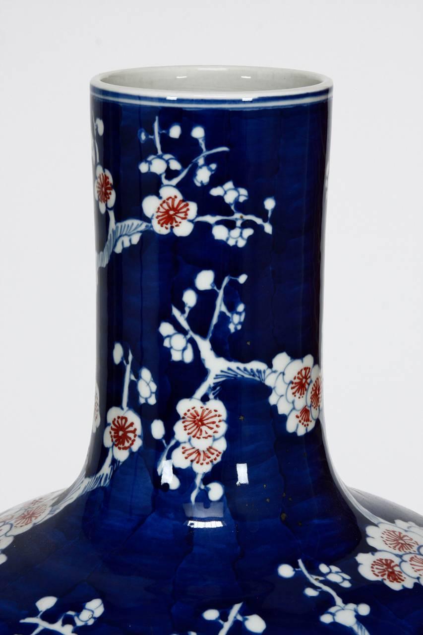 Hand-Crafted Chinese Cobalt Blue and White Stick Neck Prunus Vase
