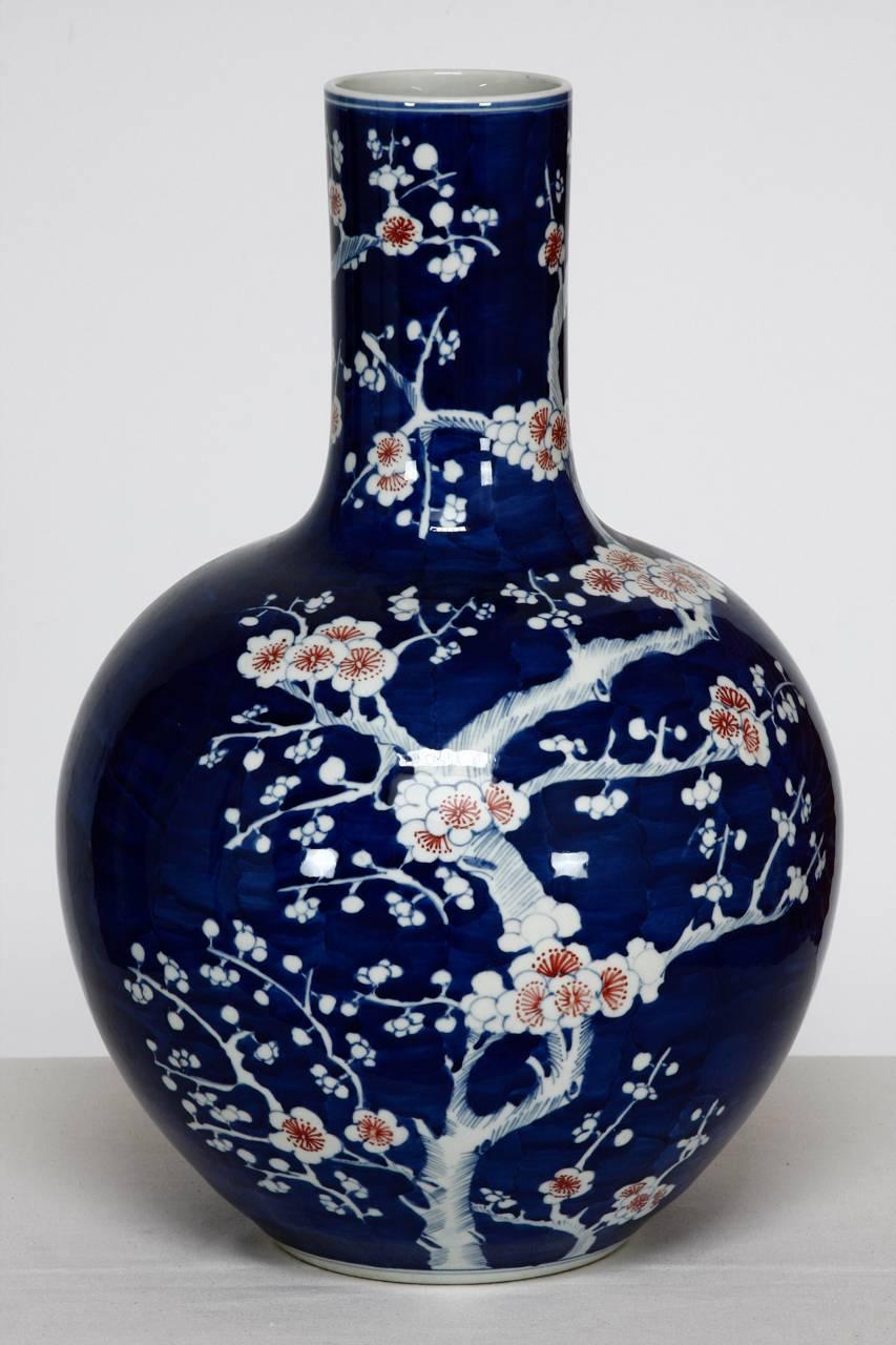 20th Century Chinese Cobalt Blue and White Stick Neck Prunus Vase