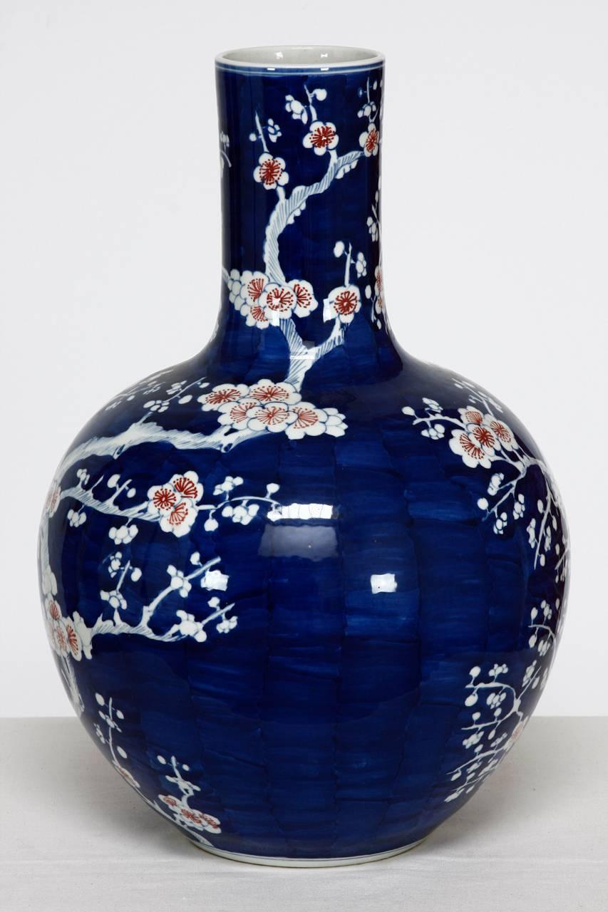Porcelain Chinese Cobalt Blue and White Stick Neck Prunus Vase