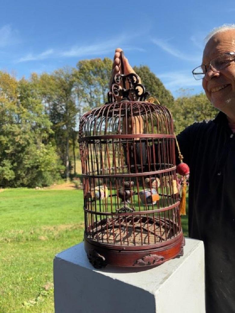 From our recent Japanese acquisitions and found in original condition

The first complete bird cage we have seen.

Found in Japan, this attractive antique Chinese hand crafted wooden bird cage is replete with four multi glazed porcelain feeding