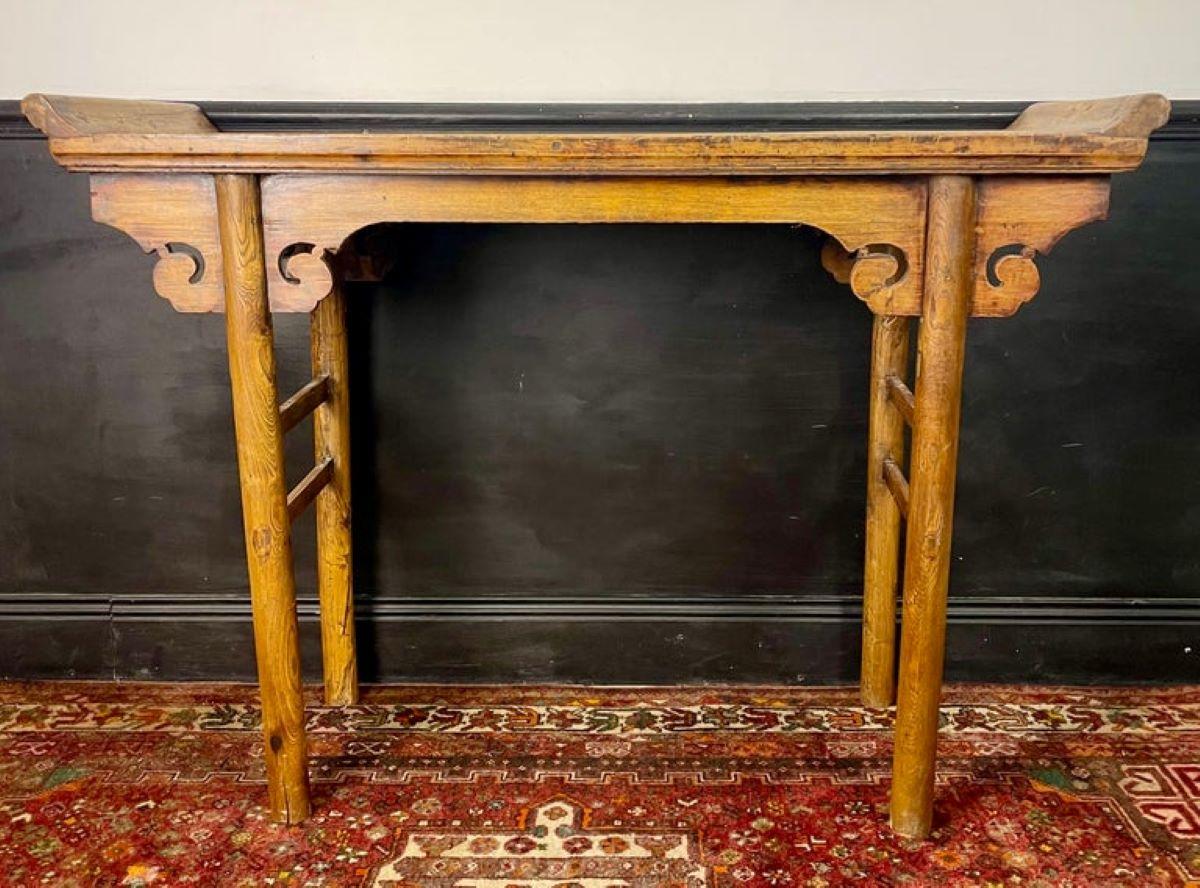 Traditional Chinese console table, pingtouan from the 19th century - Qing Dynasty.
The console is double-sided, in fact the sculptures are the same on each side.
The table top reveals the natural patterns of the wood.
Made from high quality