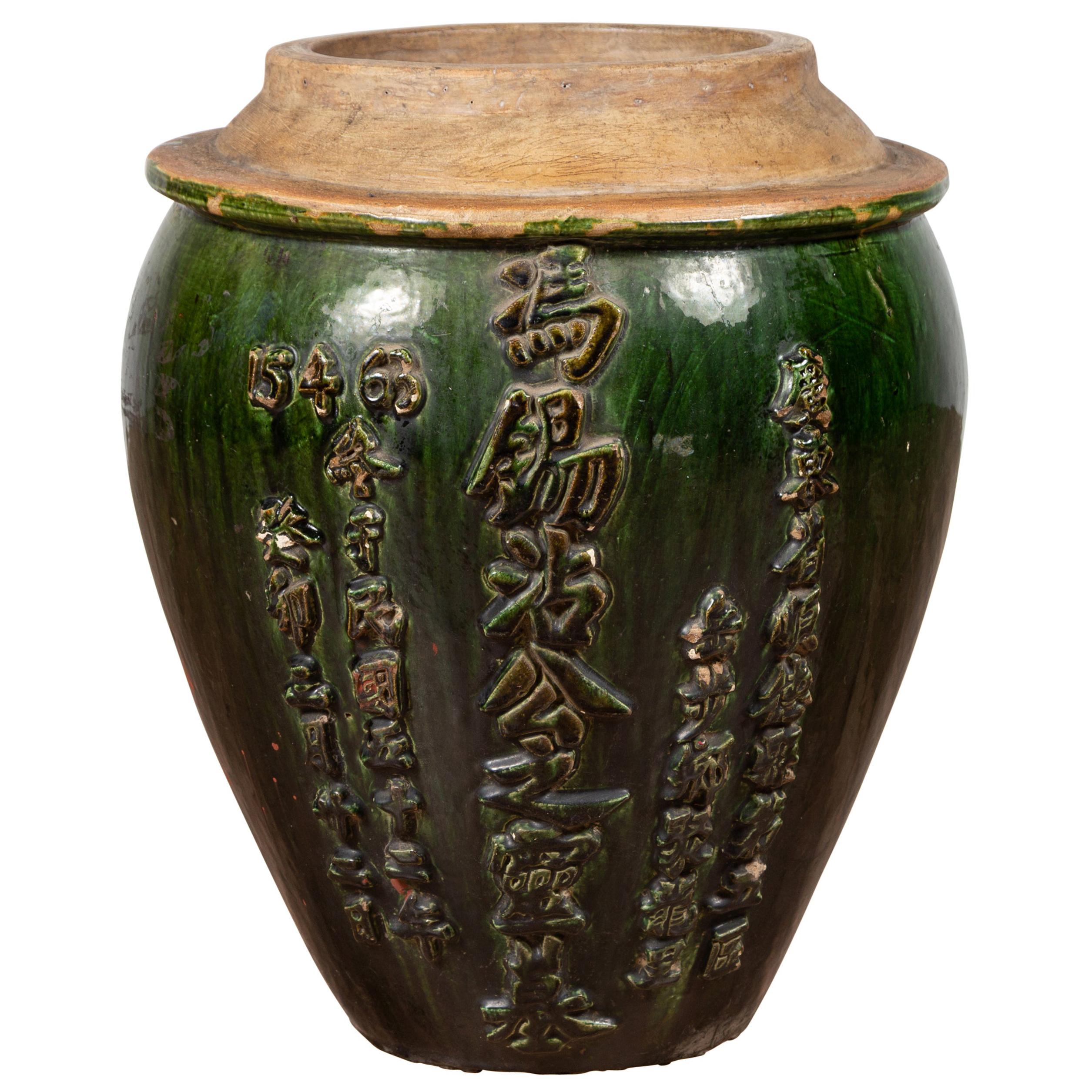 Poterie chinoise contemporaine de cruches à eau émaillée verte avec calligraphie