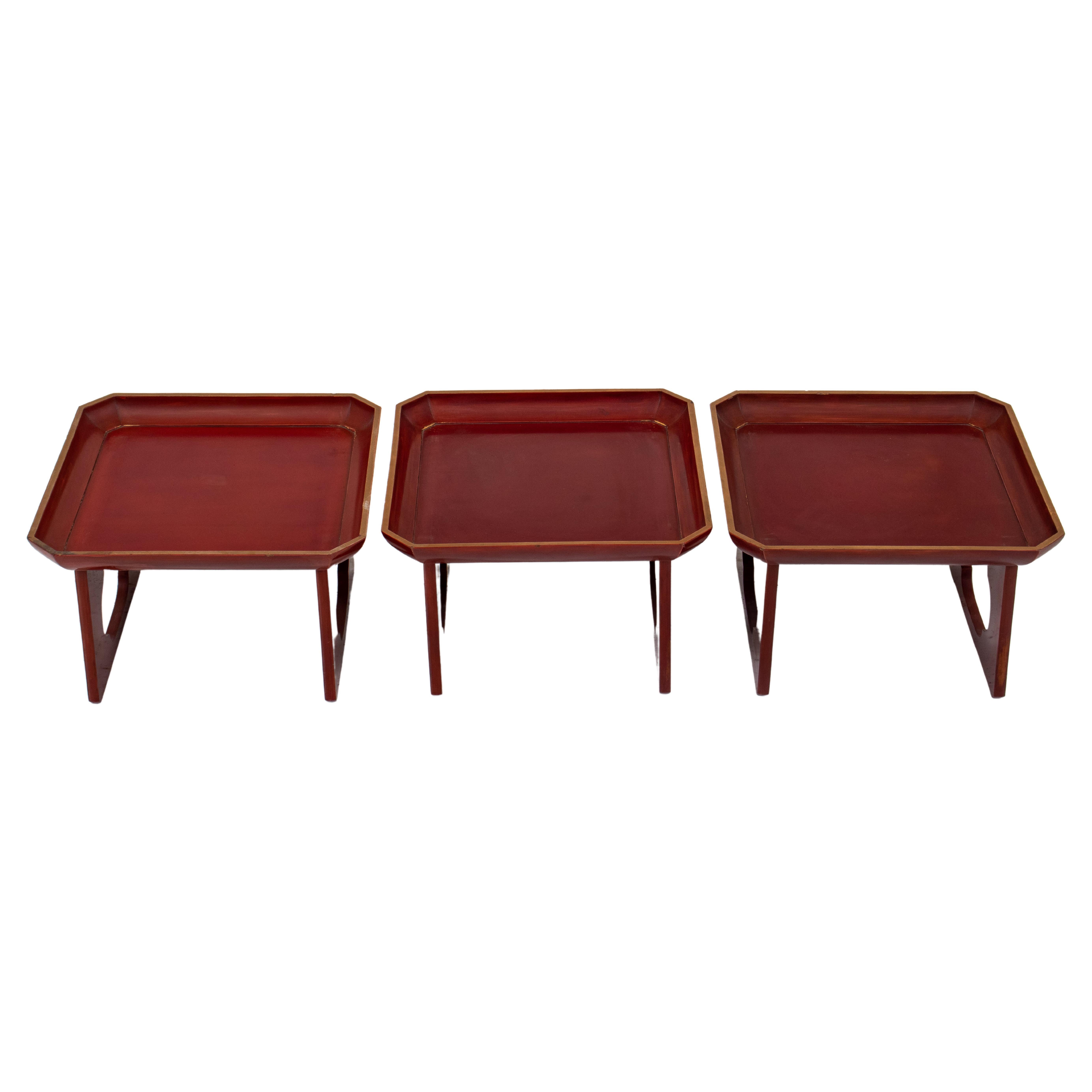 Chinese Copper Red Lacquer Stacking Tables, 3 For Sale