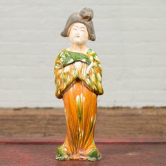 Court Lady Statue with Egg and Spinach Pattern Kimono and Holding a Dog