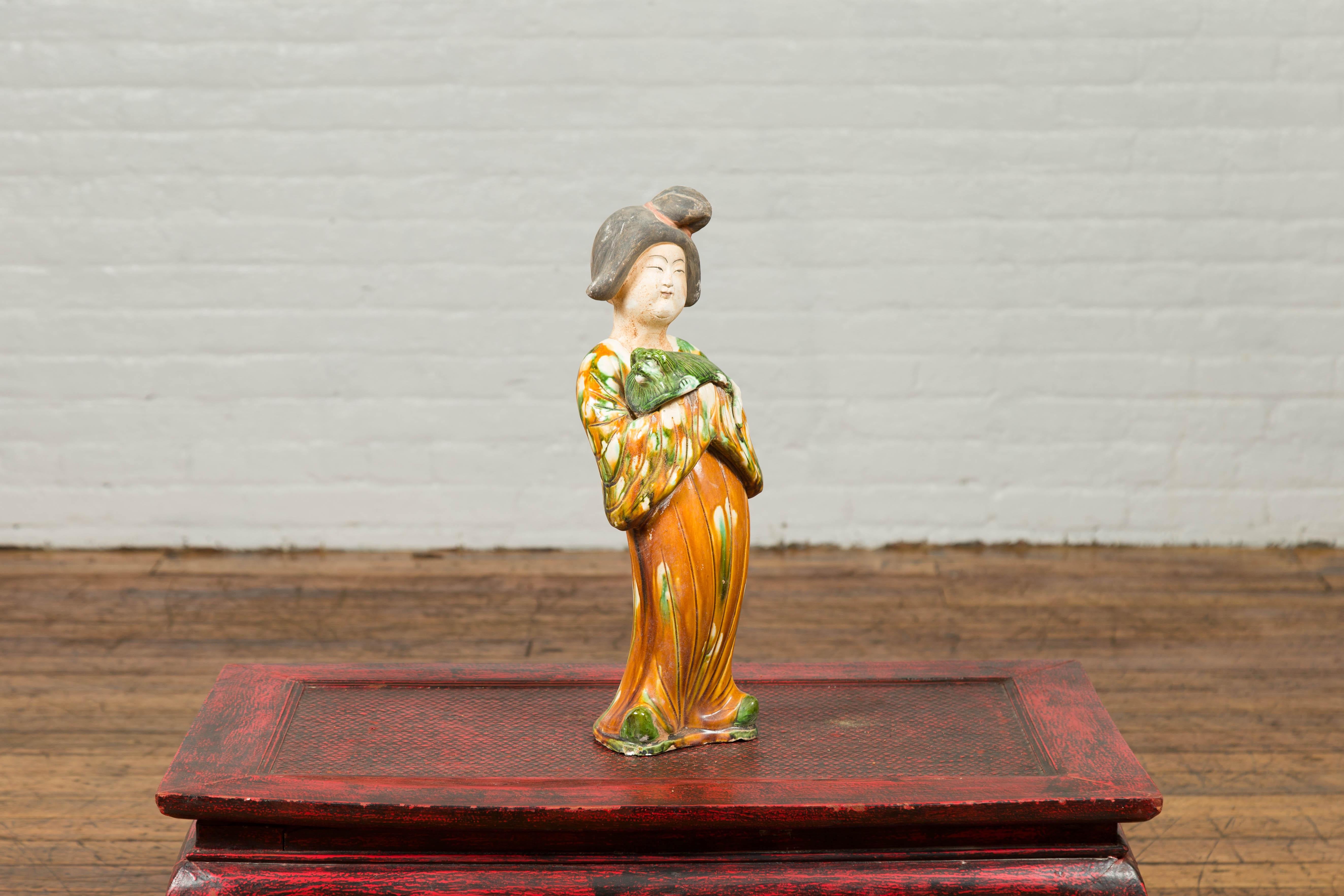 Chinese Court Lady Statue with Egg and Spinach Pattern Kimono and Holding a Dog In Good Condition For Sale In Yonkers, NY