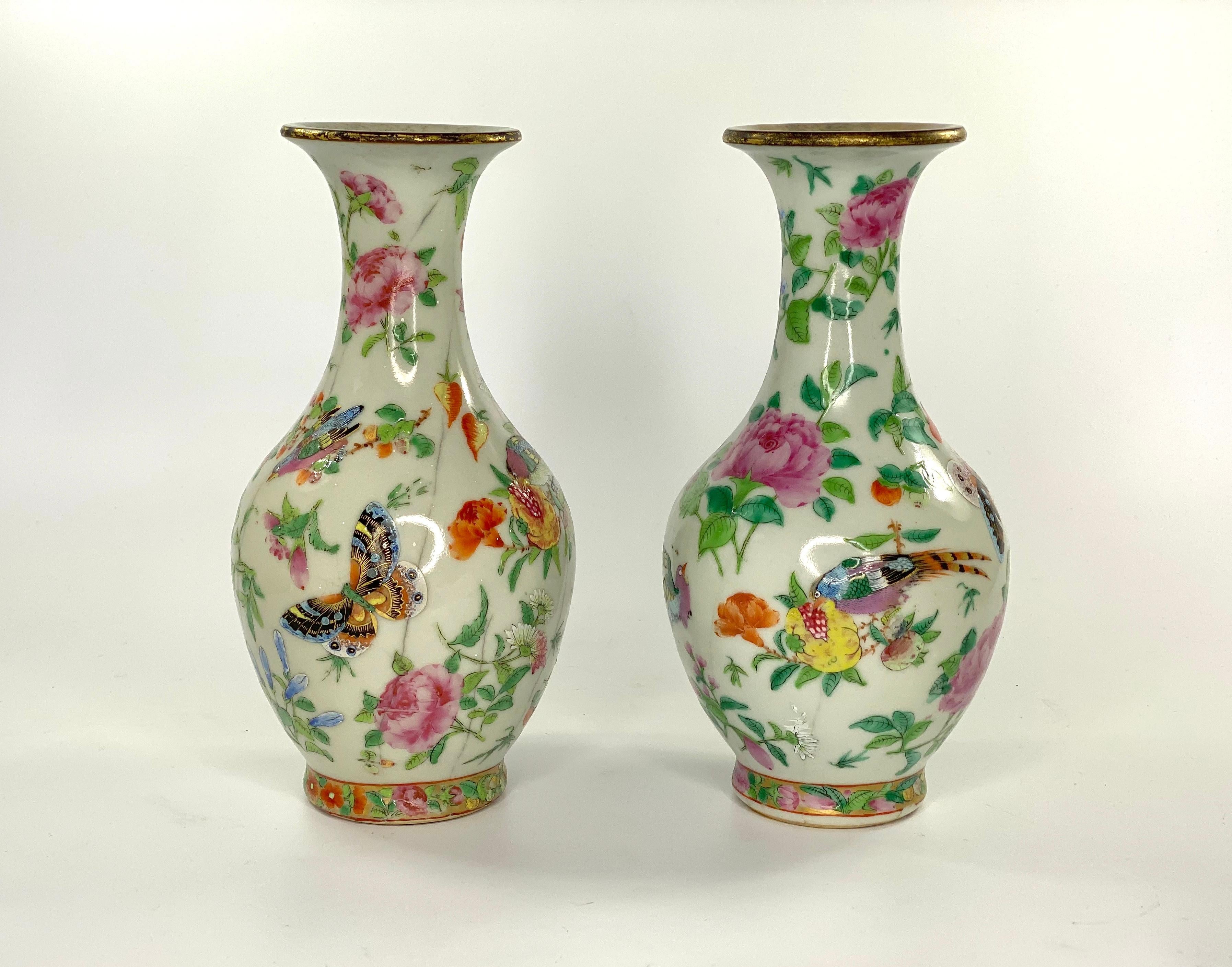 £690.00
Pair of Chinese porcelain ‘Guan’ type vases, circa 1880. The deliberately crackle glazed vases, well painted in Famille Rose enamels, with birds, insects and butterflies, flying amongst flowering plants, fruits and vegetables. All on a