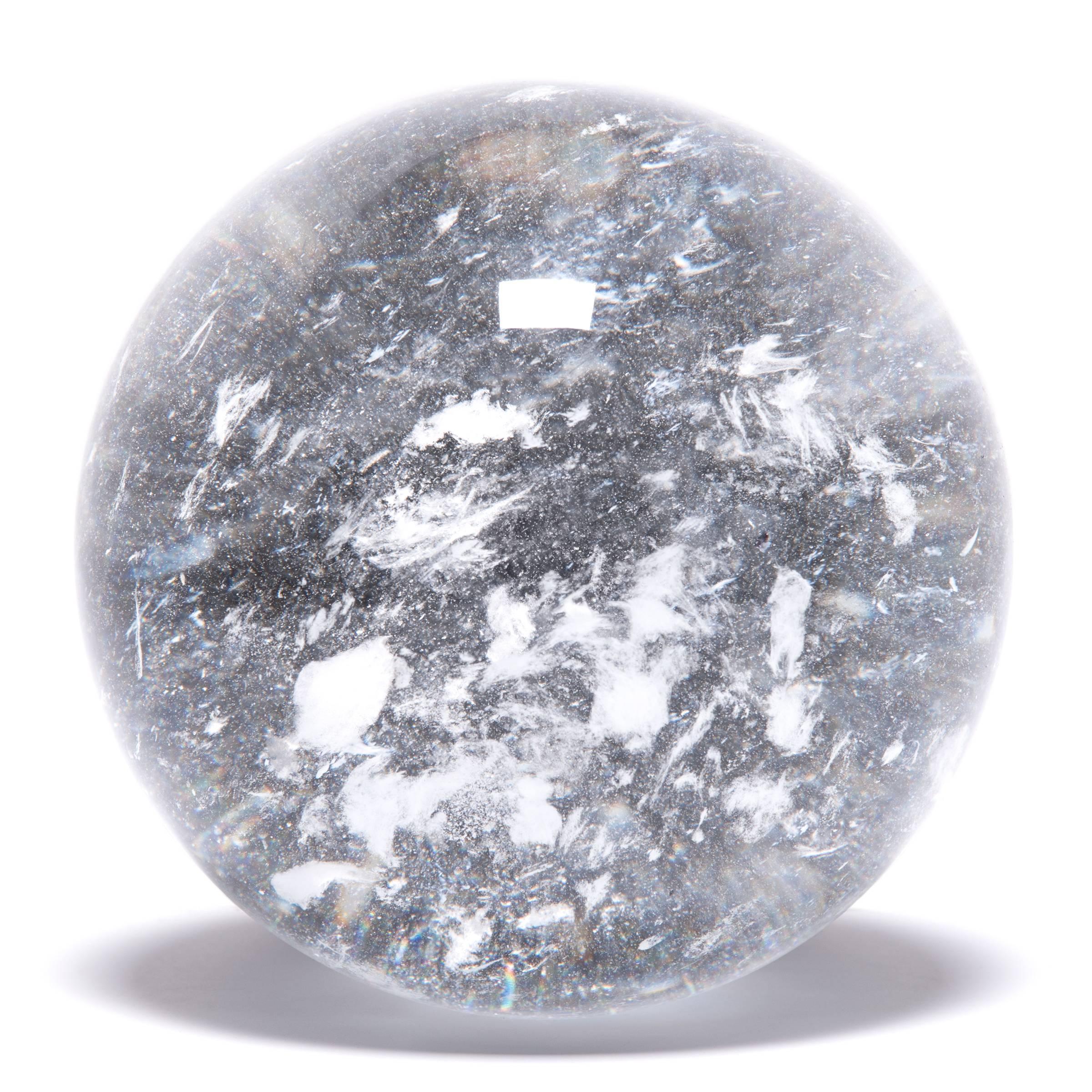 Gem lore is endless, and every culture has its own beliefs about specific stones tied to cultural history, geography, and spiritual practices. In China, some practitioners of Feng Shui value clear quartz, like this beautiful crystal ball, for its