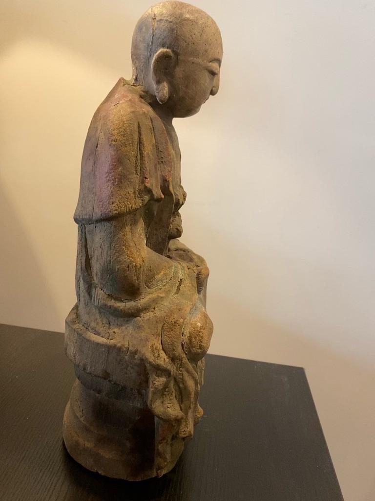 Chinese wooden hand carved Dainichi Buddha figure seated with an offering bowl polychrome Qing dynasty.