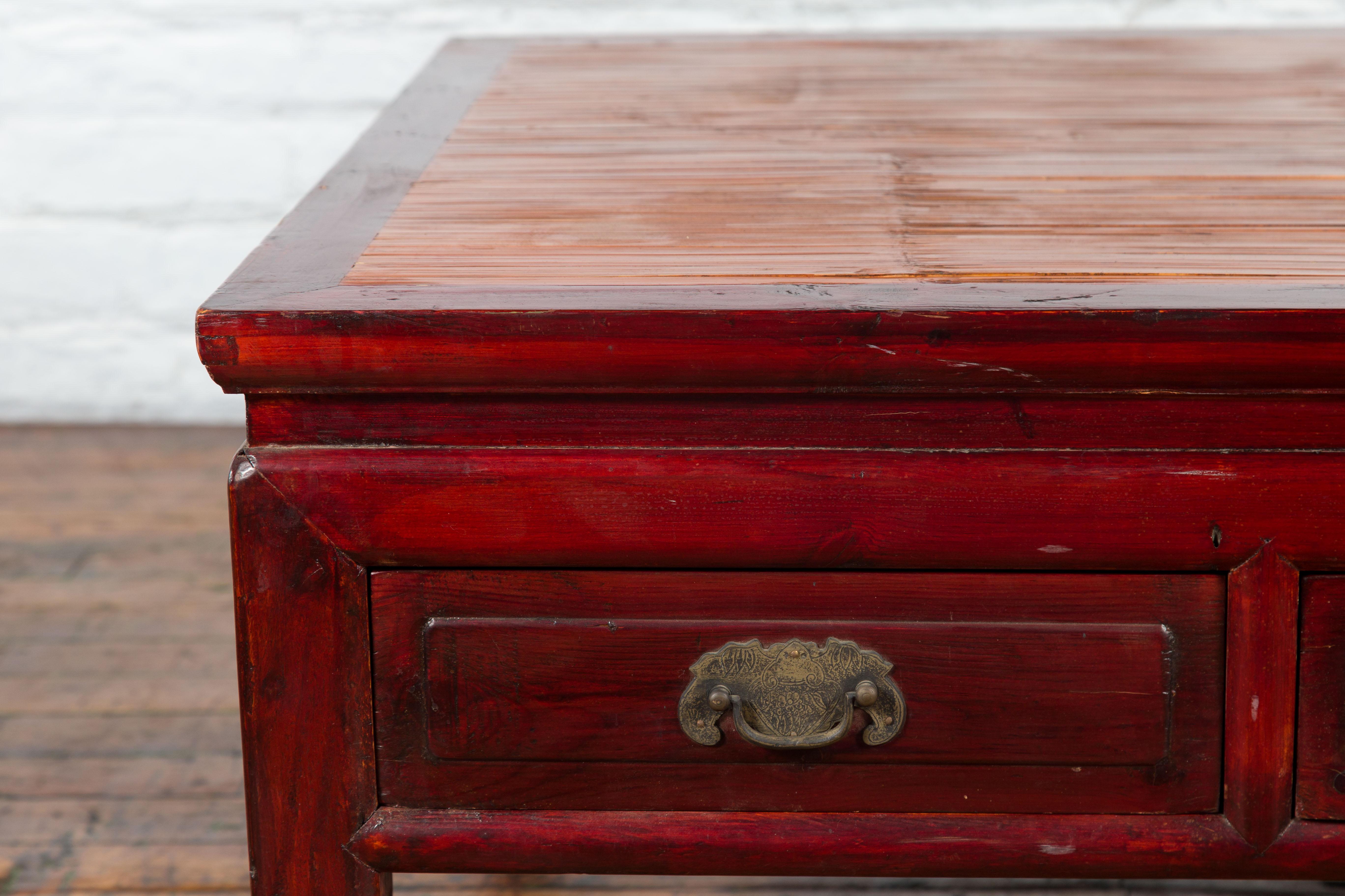 20th Century Chinese Dark Red Lacquered Coffee Table with Bamboo Top and Long Drawers For Sale