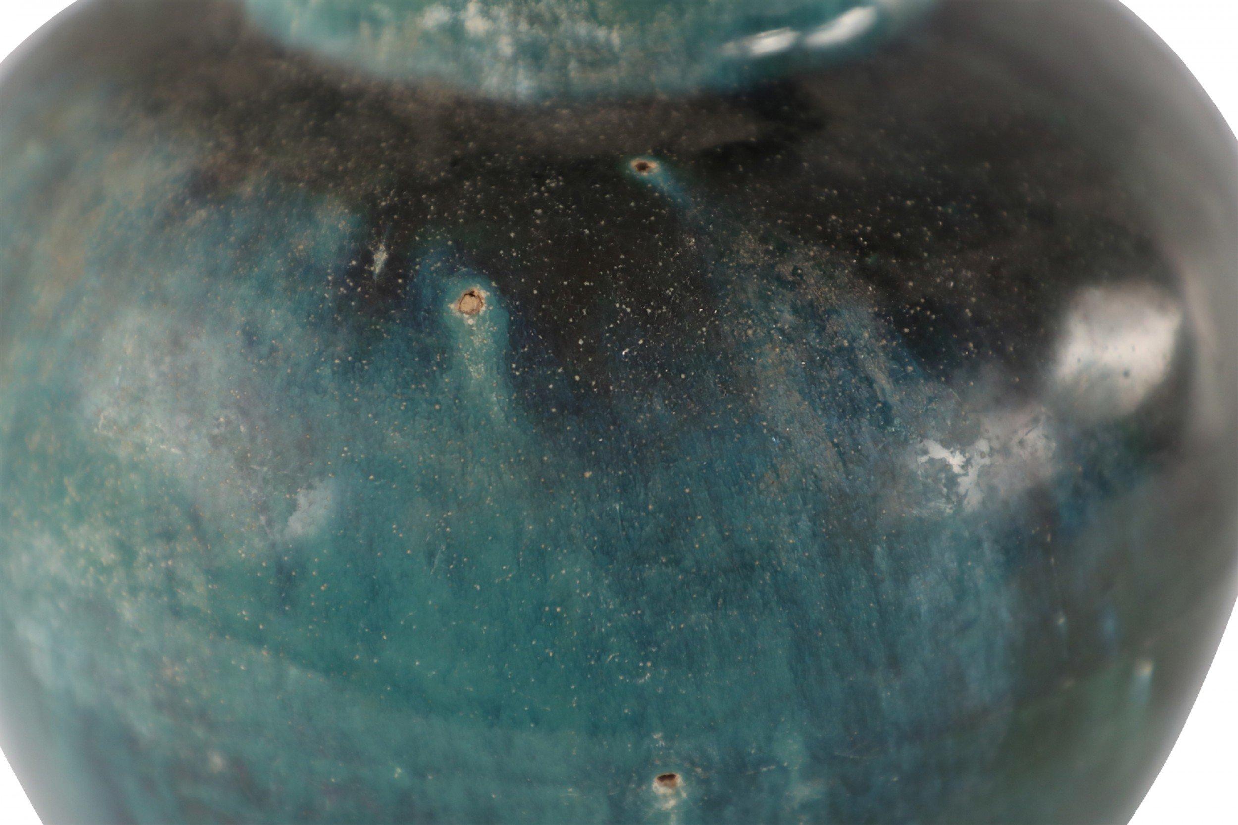 Chinese porcelain vase with a bulbous form and painterly, shifting finish revealing multiple shades of teal, green, and umber.
 