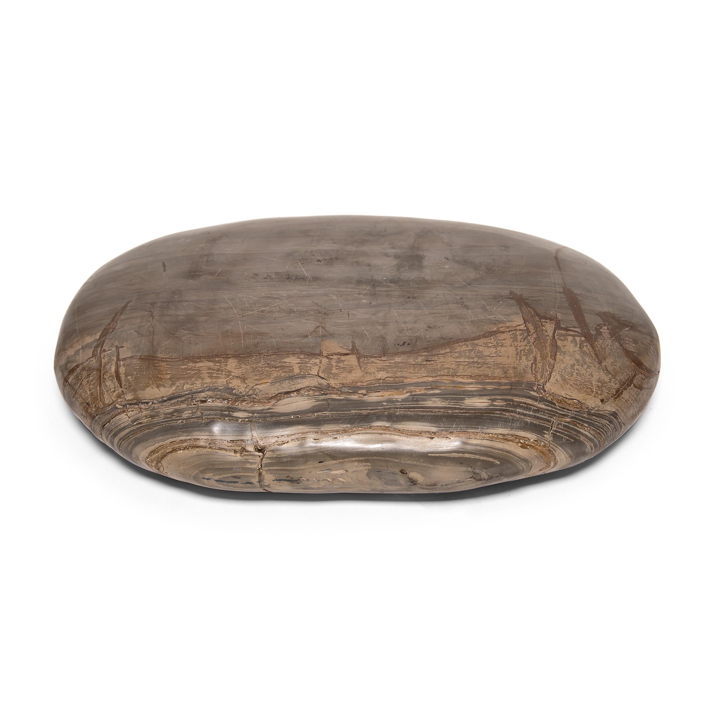A well-chosen stone is a focal point of both a traditional Chinese garden and a scholar's studio, evoking the grandeur of nature and inspiring creative thought. Meditation stones offer the mind a place to focus - not unlike modern abstract art, each