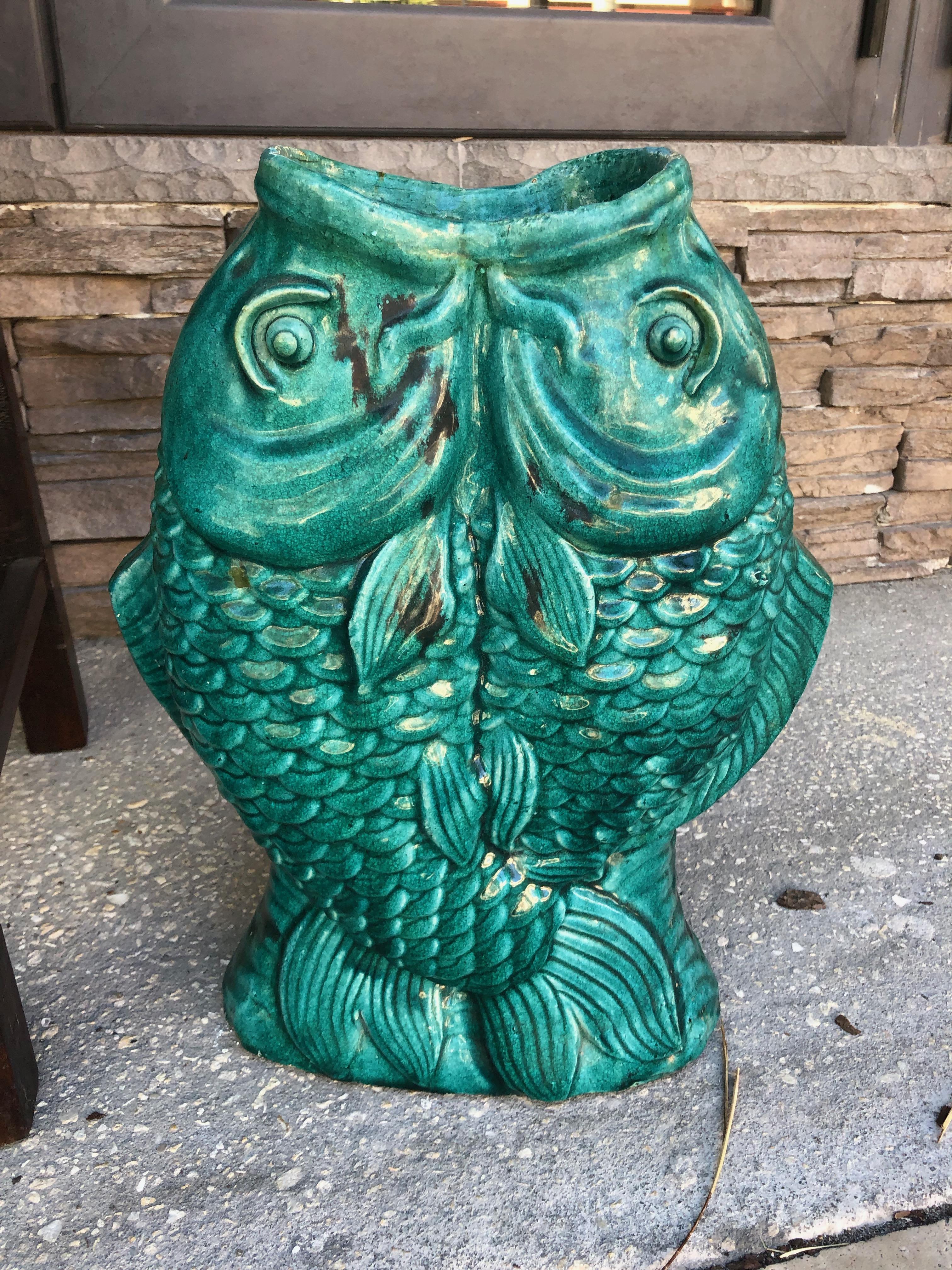 This vase was made before the War (WWII) leaded glaze made in the Shi Wan Kiln in Guangzhou, China by the Yuhua Ceramic Company.