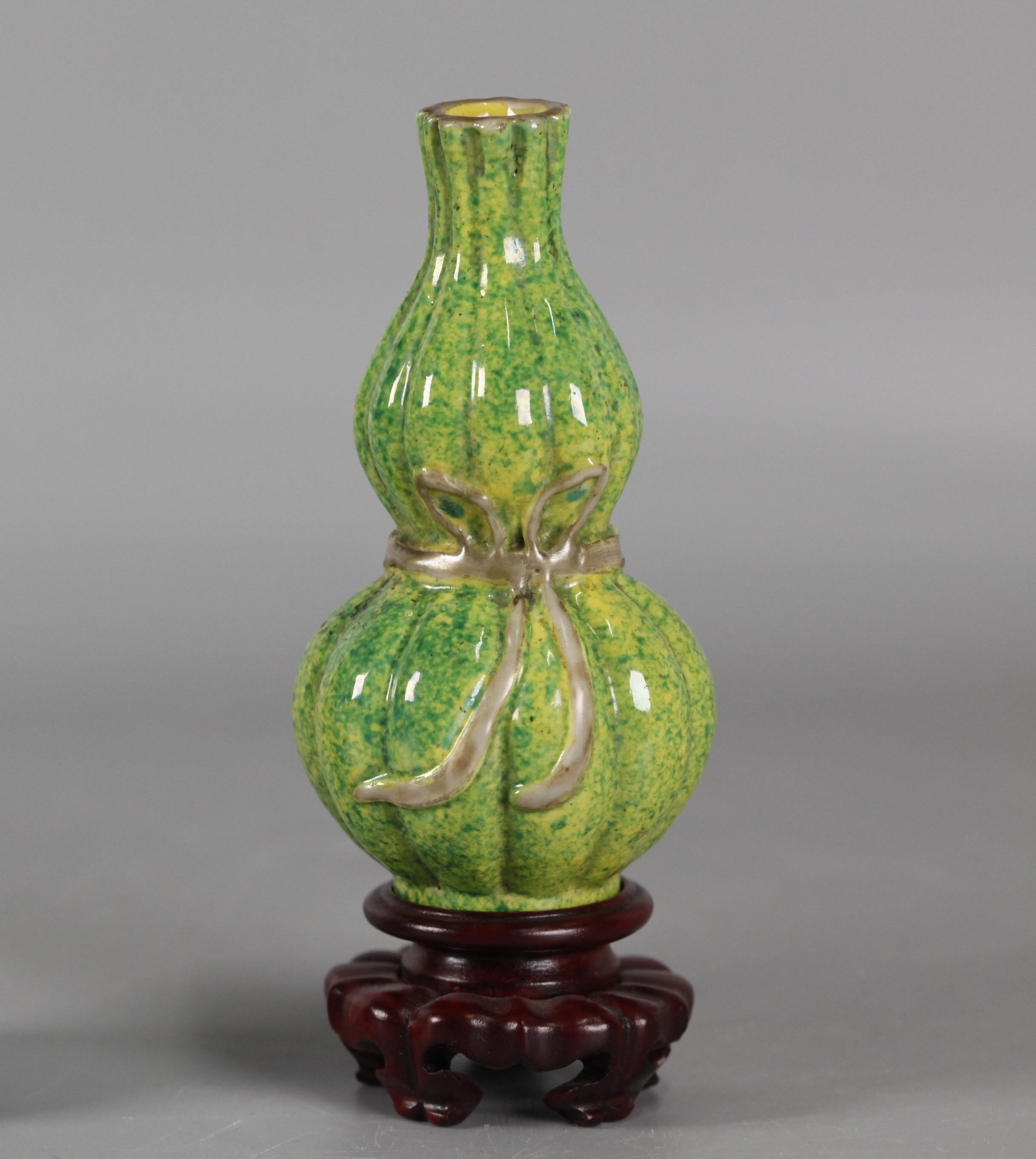 lime green glazed; 2.2in(D) x 2.2in(W) x 4.4in(H) are the dimensions of the vase only (not including the wooden base); the wooden base shown in the pictures is not included with this item 
