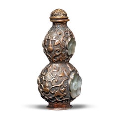 Chinese Double Gourd Repoussé Snuff Bottle with Jade Buttons, c. 1850