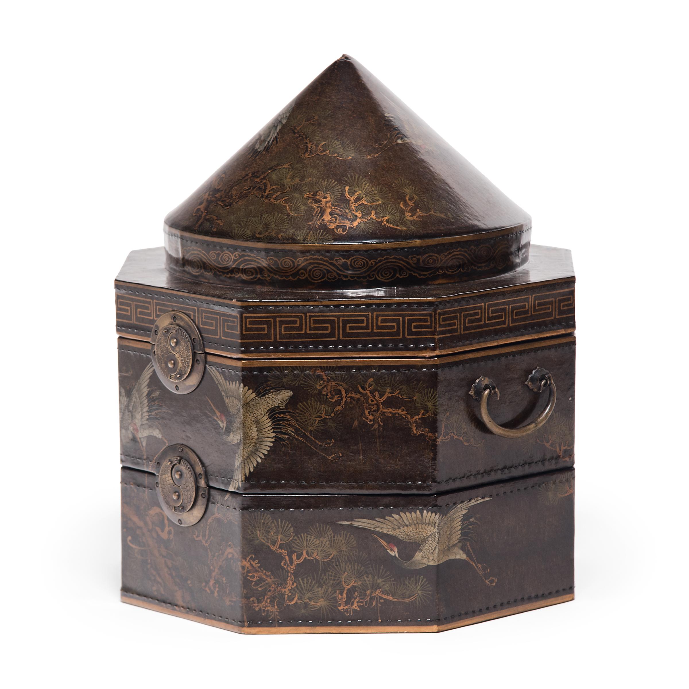 No self-respecting man in Qing-dynasty China would leave the house without some kind of hat. In fact, headgear was so central to social status that even the containers used to store one's hat were beautifully constructed. This luxurious gilt hat box