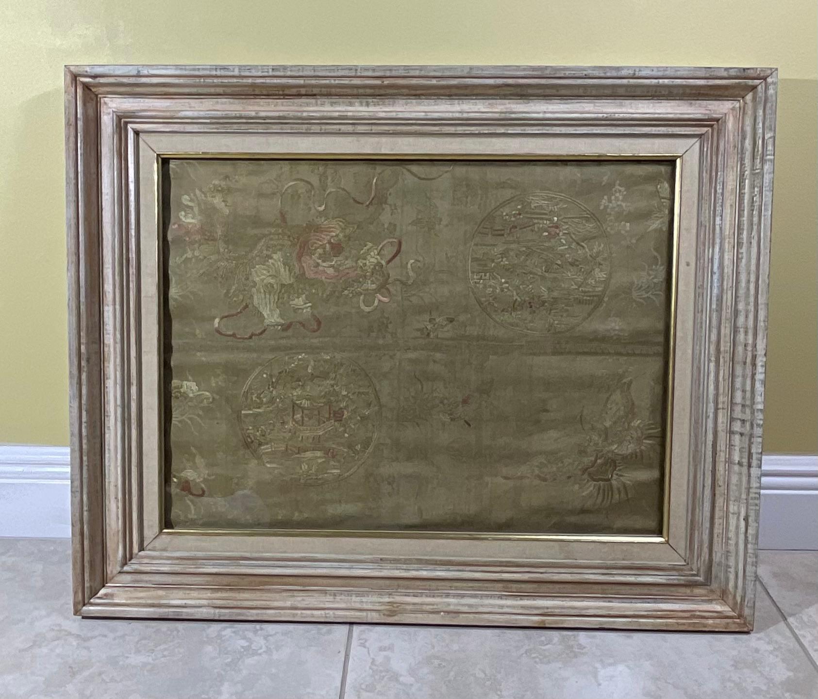 
Antique   Chinese textile, with a finely nicely ,dragon , flowers and butterfly , and garden scenery , embroidery on  cream color silk background. Displayed professionally in impressive solid wood vintage shadowbox. 
Size of textile only “ 23.5 x