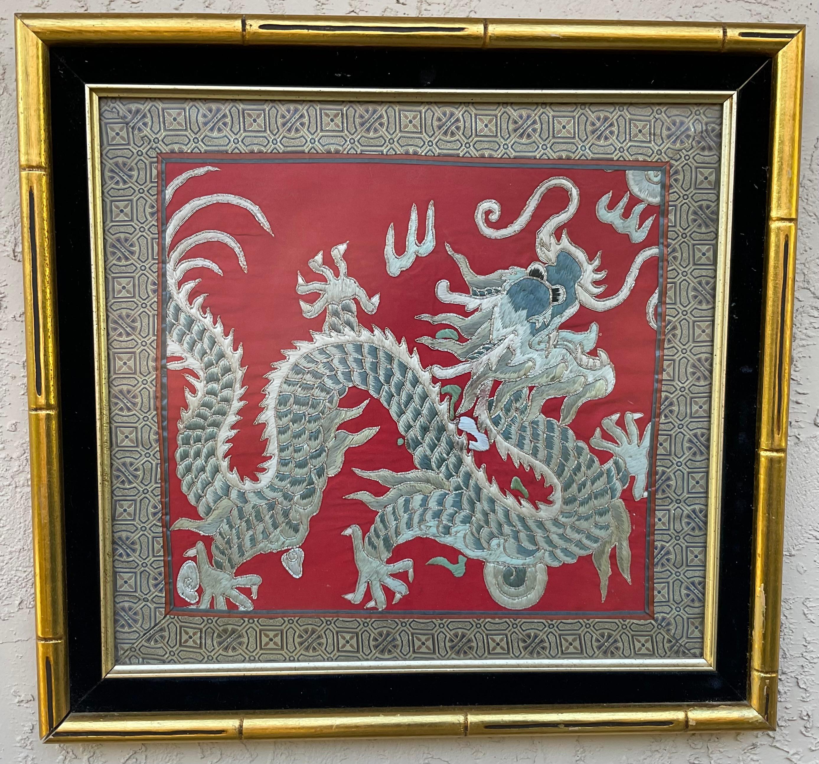 
Vintage  Chinese textile, with a finely detailed nicely dragon embroidery on  red silk background. Displayed in a contemporary gold wood frame with black velvet mat. 
Size of textile only “ 13”75 x 14”.75