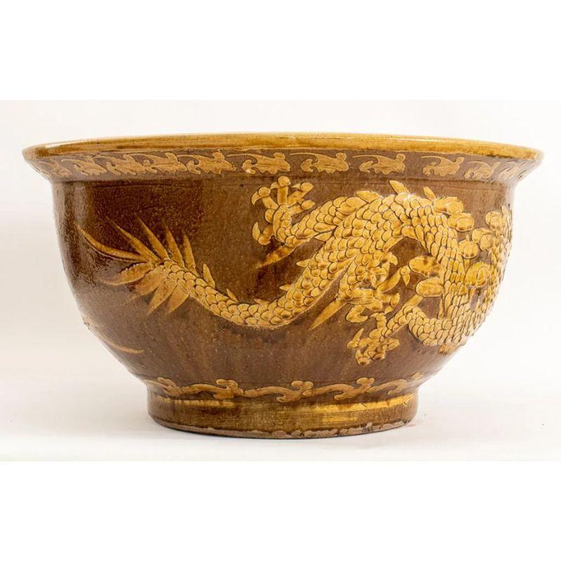 Glazed Chinese Dragon Motif Ochre Jardiniere For Sale