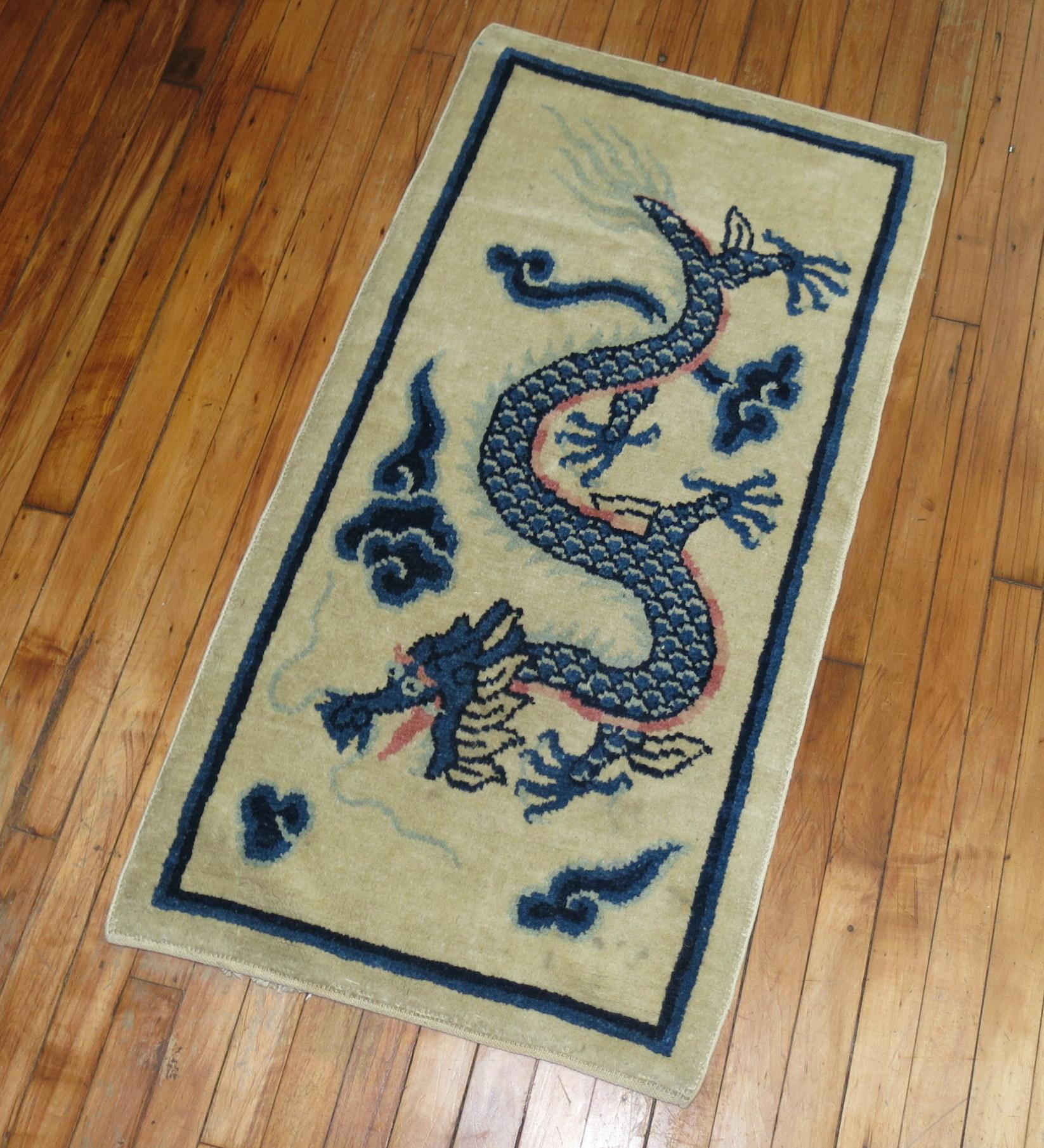 Vintage Chinese Animal Dragon rug in excellent full pile condition on ivory ground.