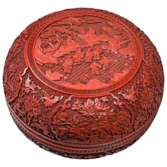 Chinese, Early 19th Century Round Beijing Red Lacquer Box and Cover