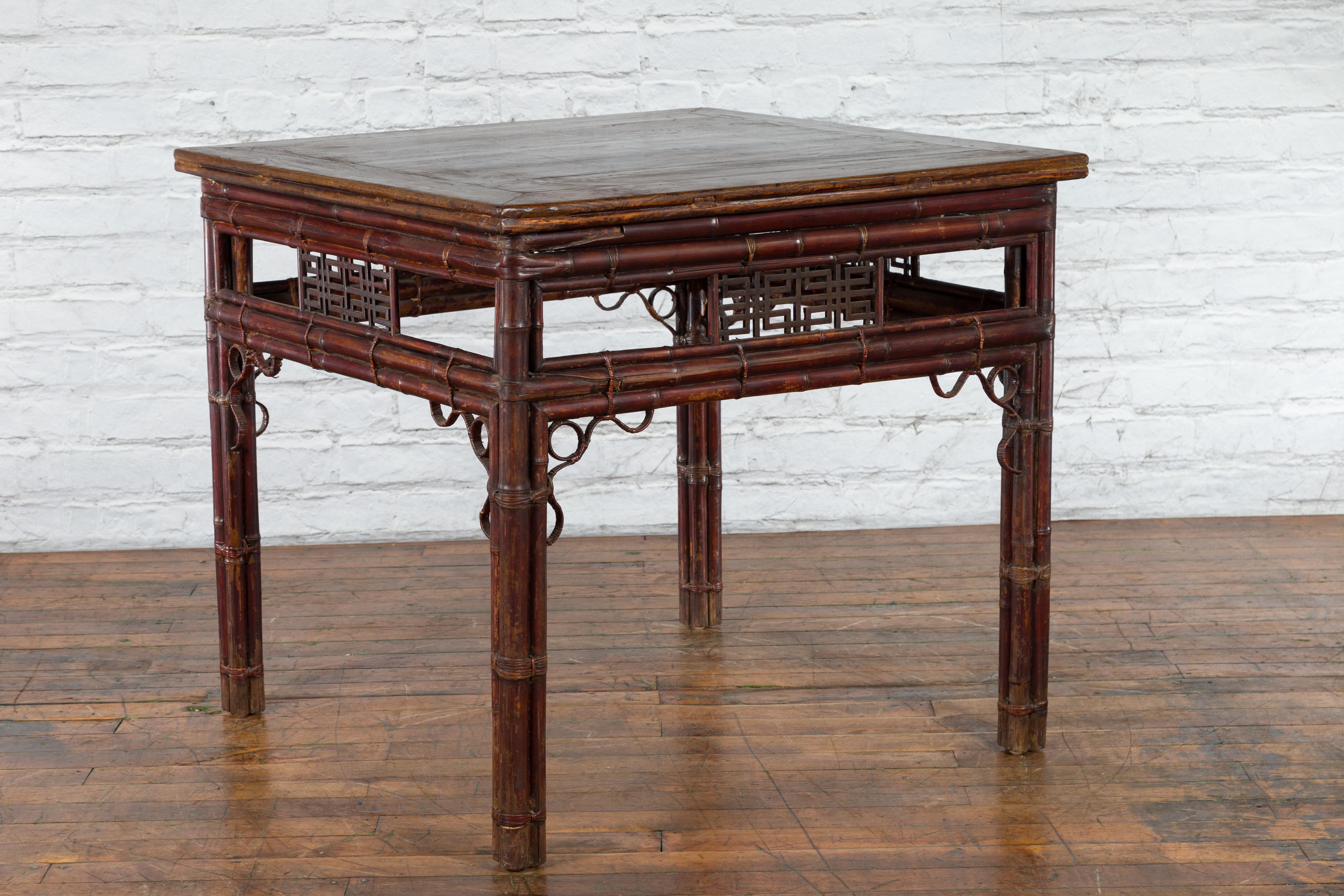 Chinese Early 20th Century Bamboo and Elm Wine Table with Rattan Looping Accents For Sale 4