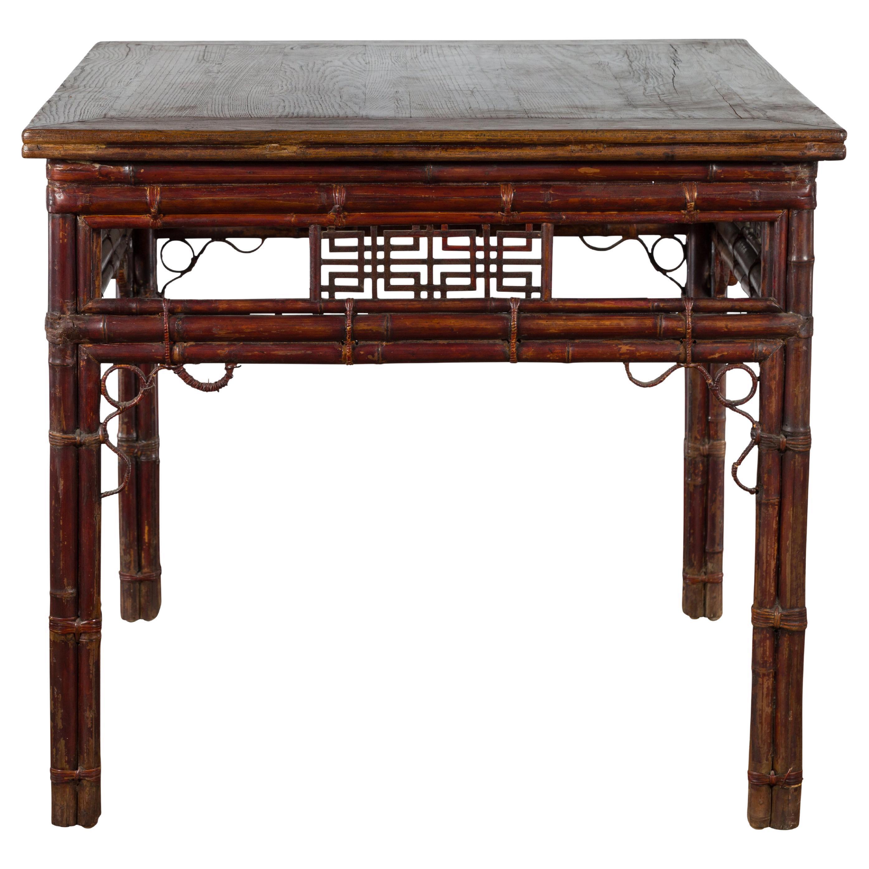 Chinese Early 20th Century Bamboo and Elm Wine Table with Rattan Looping Accents