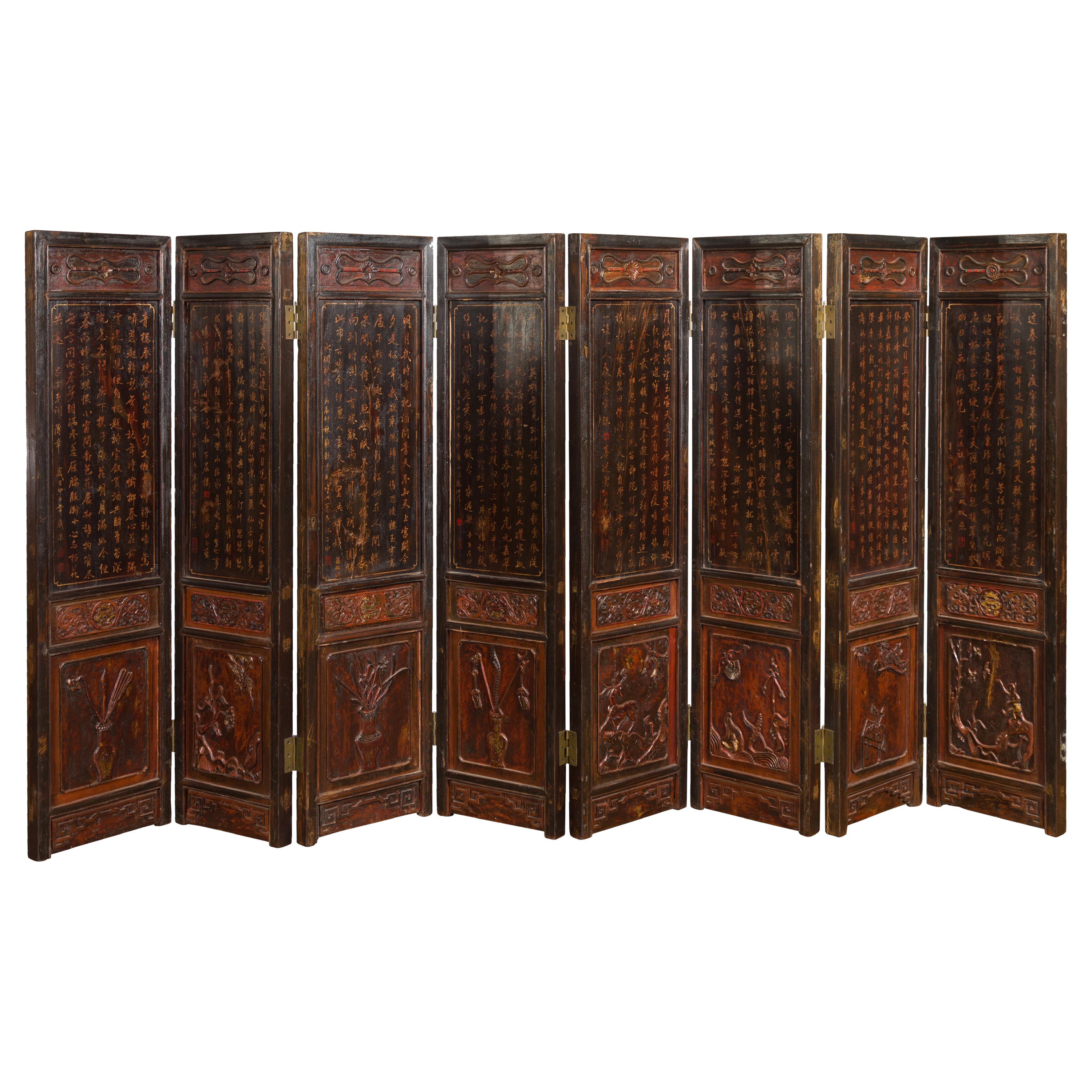 Chinese Eight-Panel Lacquered Screen with Gilt Calligraphy and Carved Decoration For Sale