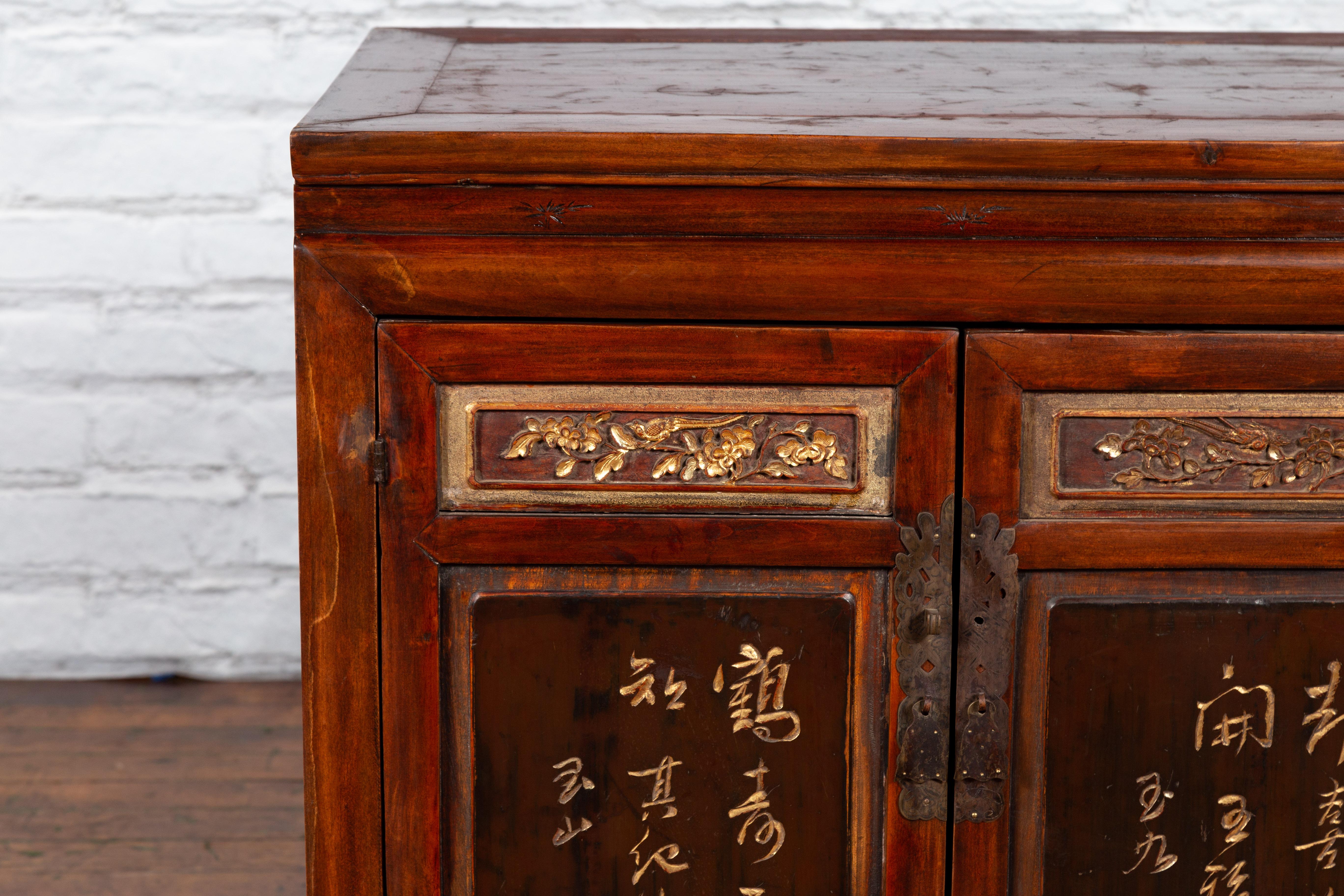 Chinese Early 20th Century Cabinet with Carved Gilded Flowers and Calligraphy 6