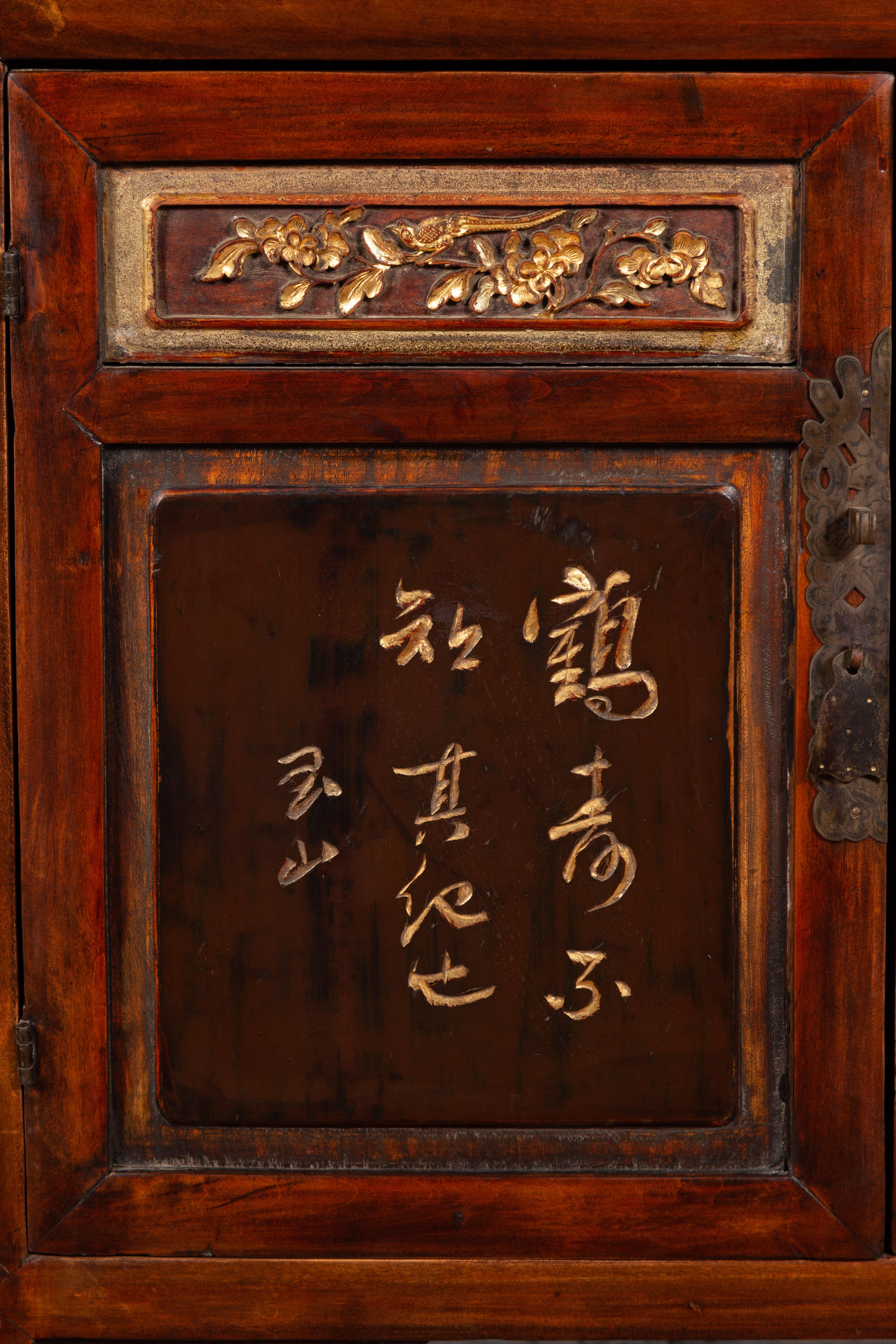 Chinese Early 20th Century Cabinet with Carved Gilded Flowers and Calligraphy 8