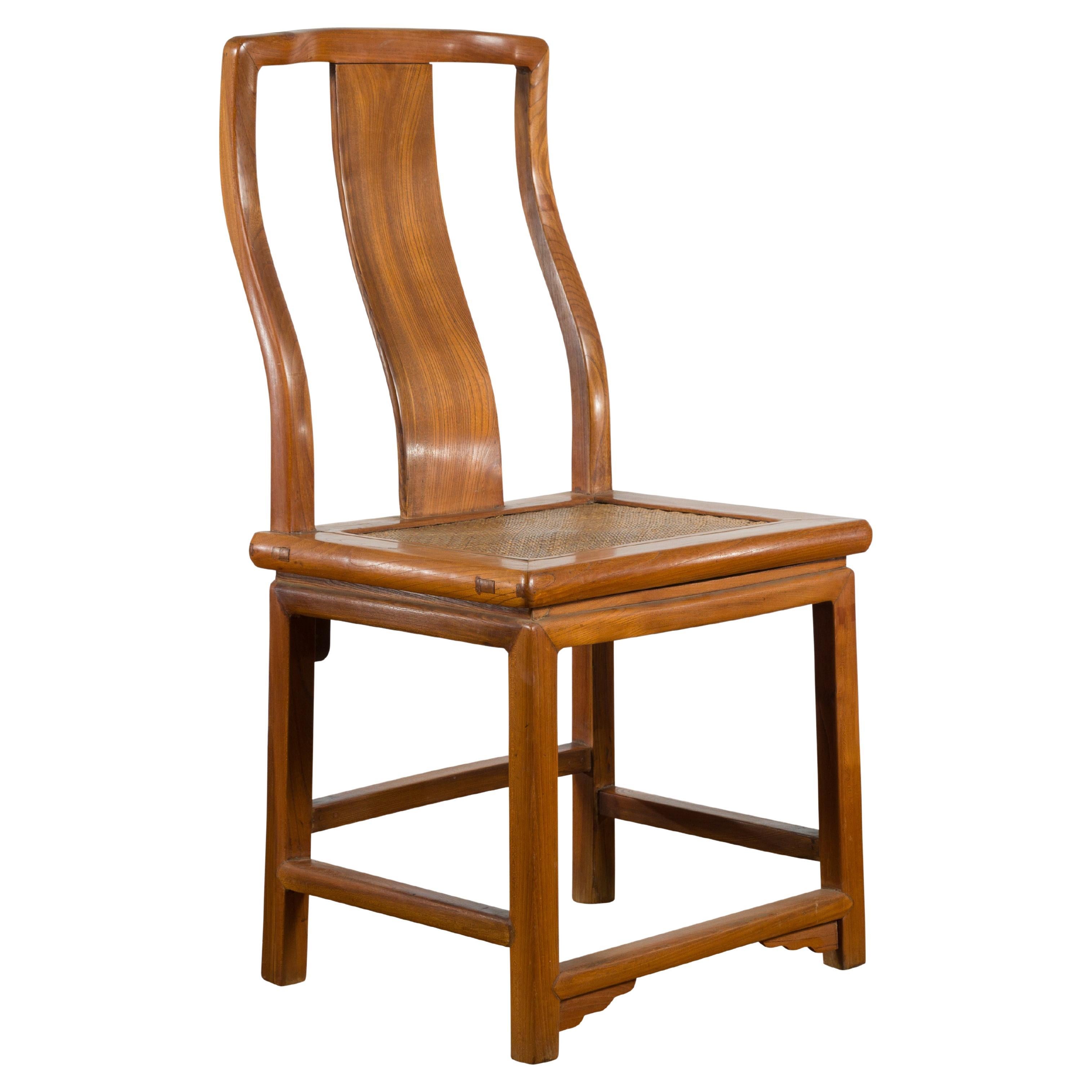 Chinese Early 20th Century Carved Elmwood Side Chair with Rattan Seat
