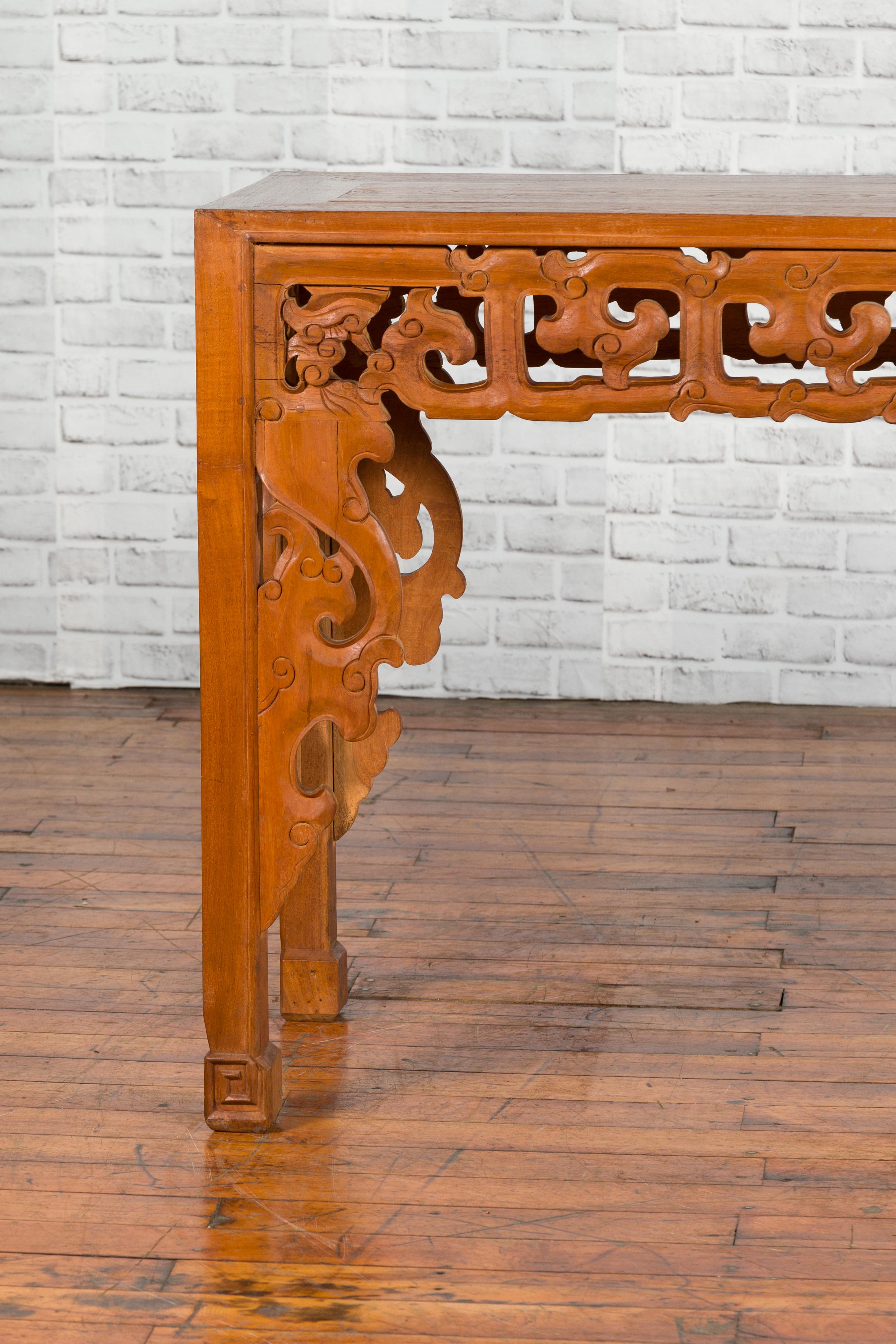 Wood Chinese Early 20th Century Console with Cloud-Carved Apron and Scrolling Feet For Sale