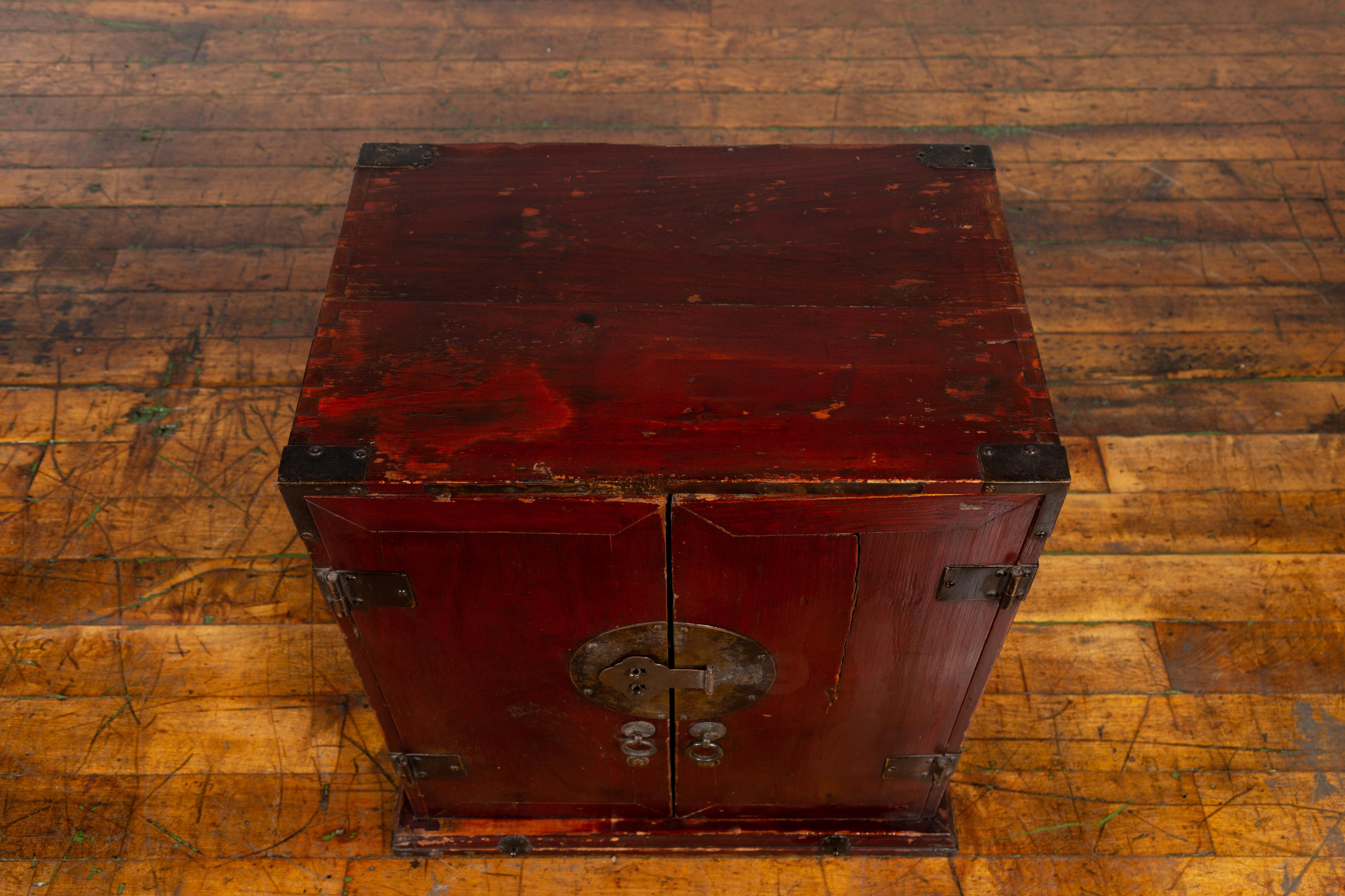 Chinese Early 20th Century Dark Red Lacquer Carrying Chest with Round Medallion 2