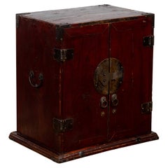 Antique Chinese Early 20th Century Dark Red Lacquer Carrying Chest with Round Medallion
