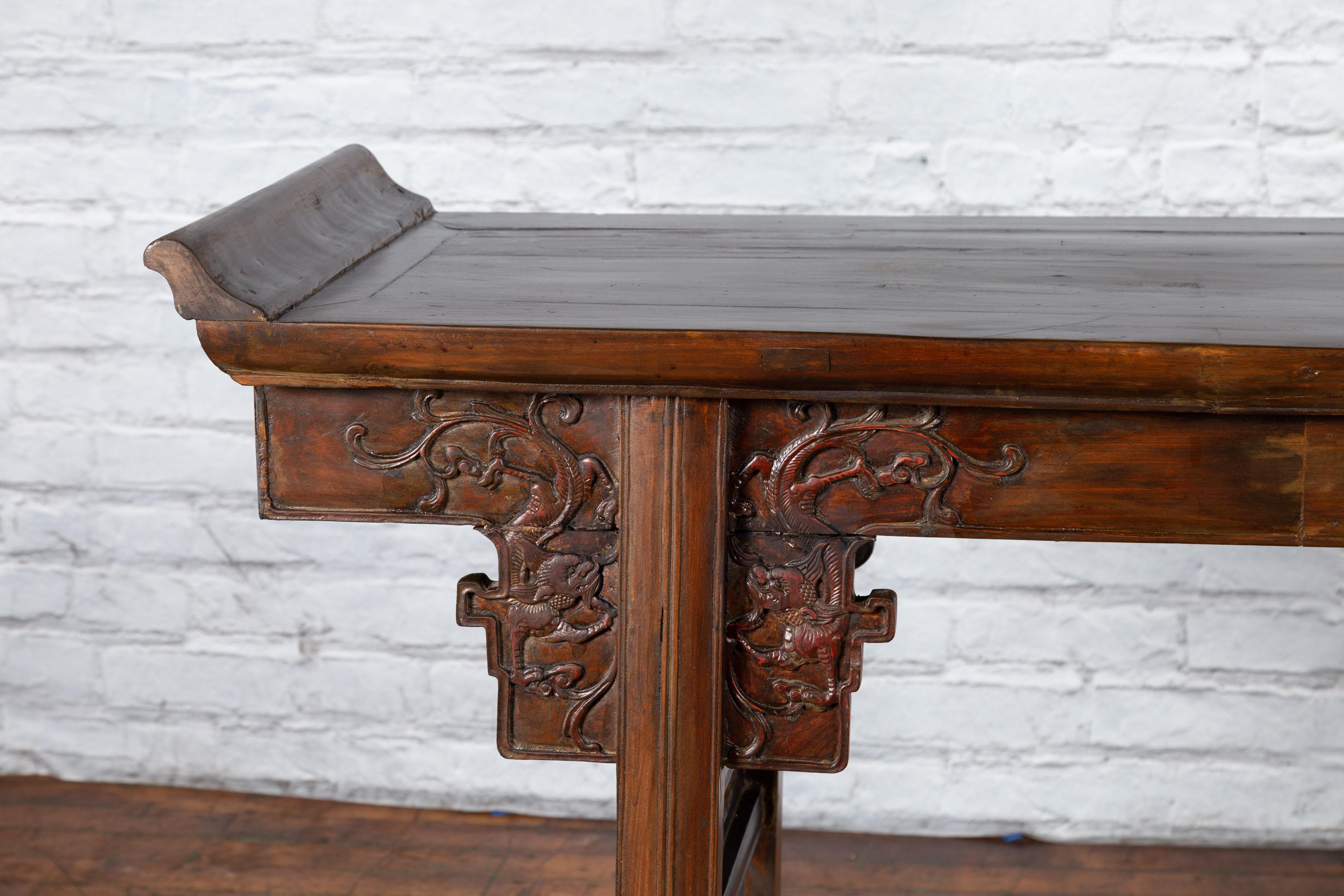 Chinese Early 20th Century Elmwood Altar Console Table with Carved Dragon Motifs For Sale 1