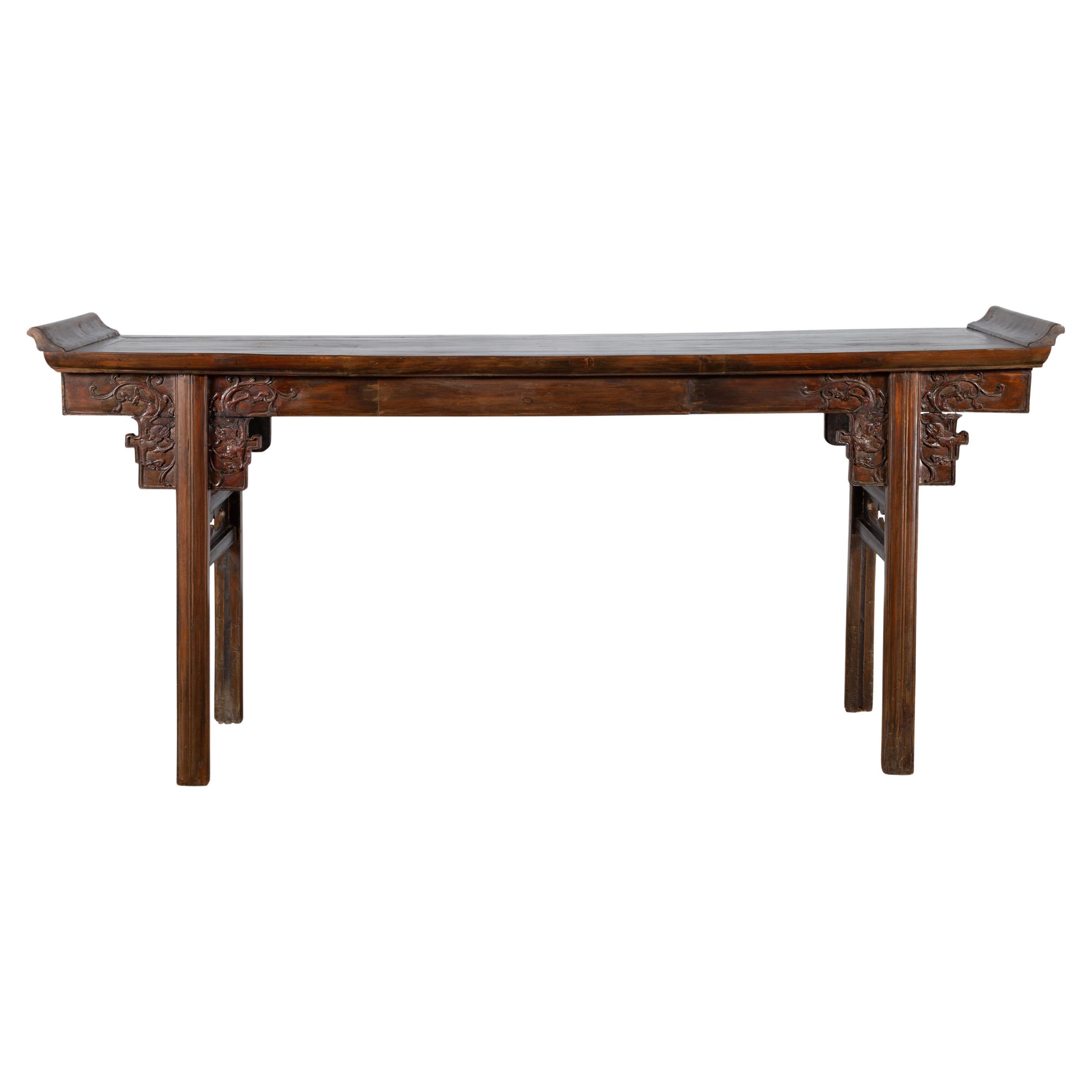 Chinese Early 20th Century Elmwood Altar Console Table with Carved Dragon Motifs For Sale