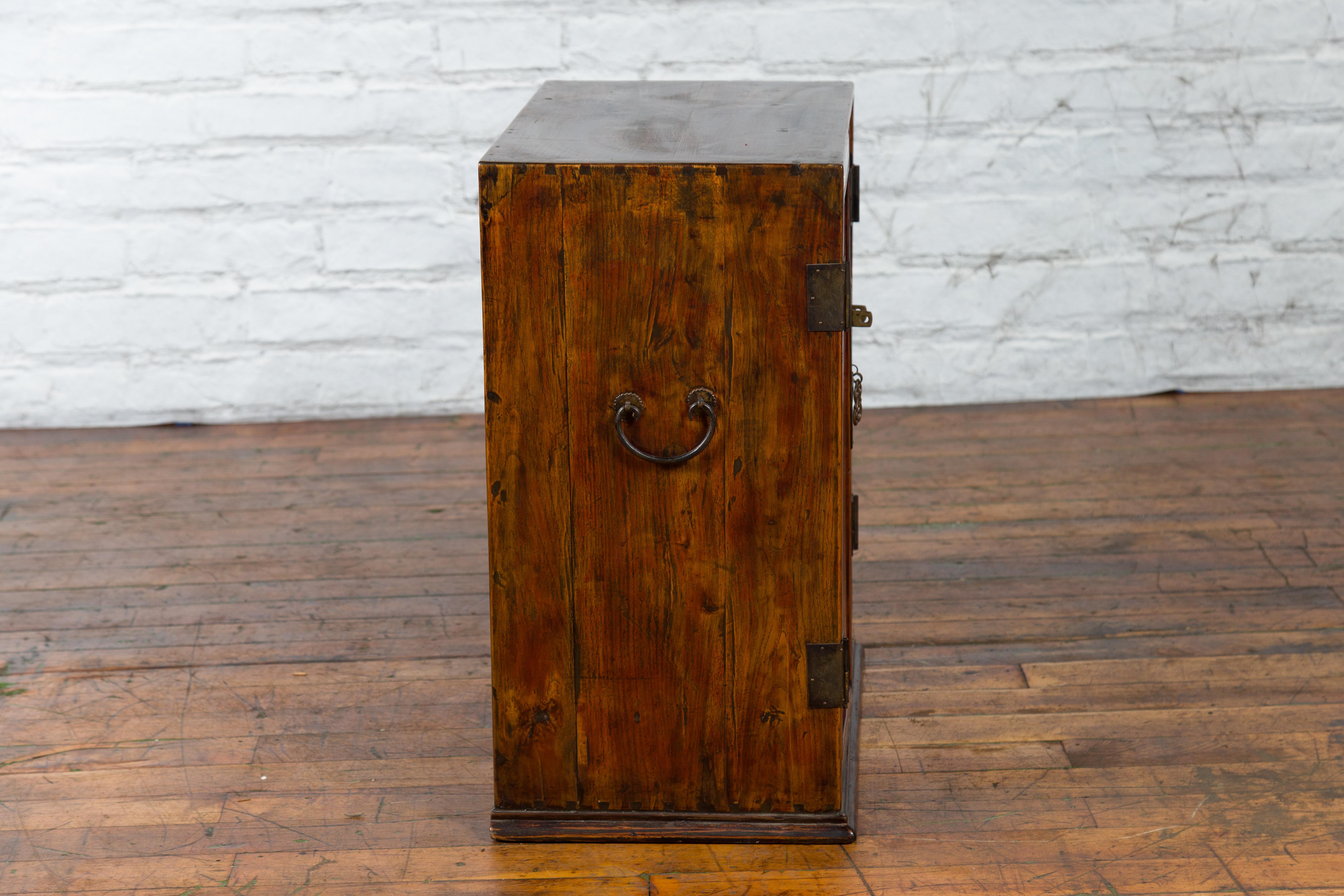 Chinese Early 20th Century Elmwood and Brass Side Cabinet with Raised Panels For Sale 9