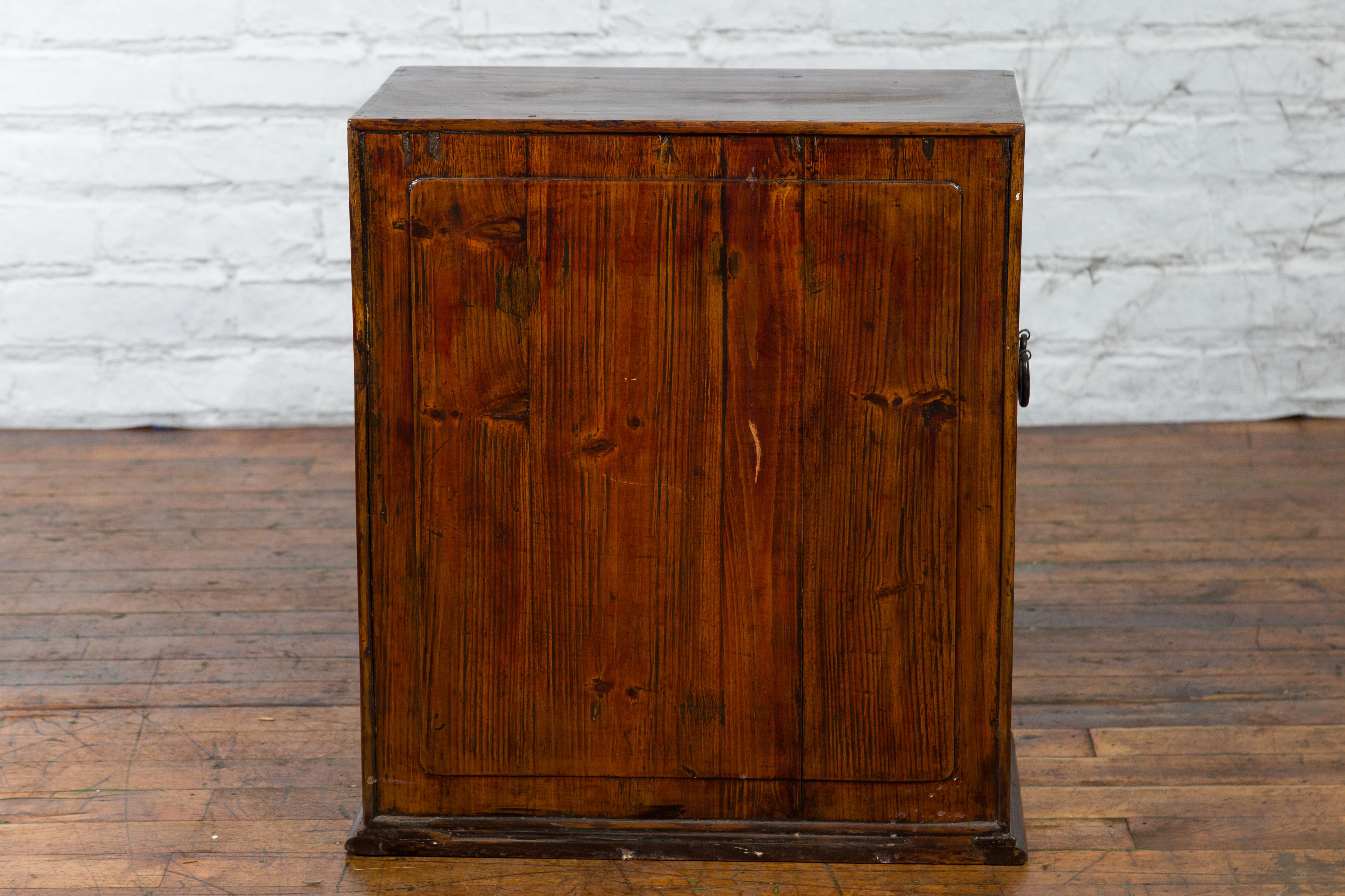 Chinese Early 20th Century Elmwood and Brass Side Cabinet with Raised Panels For Sale 10